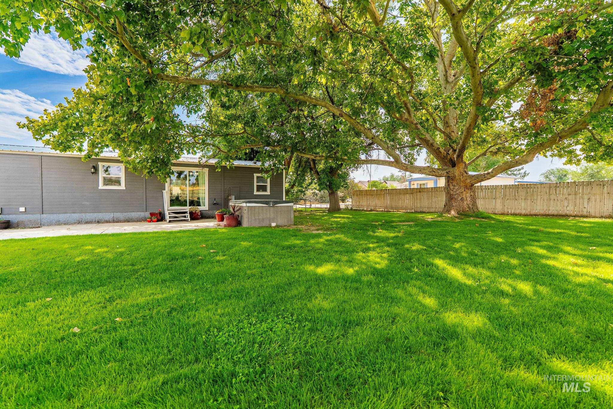 View of yard featuring a hot tub