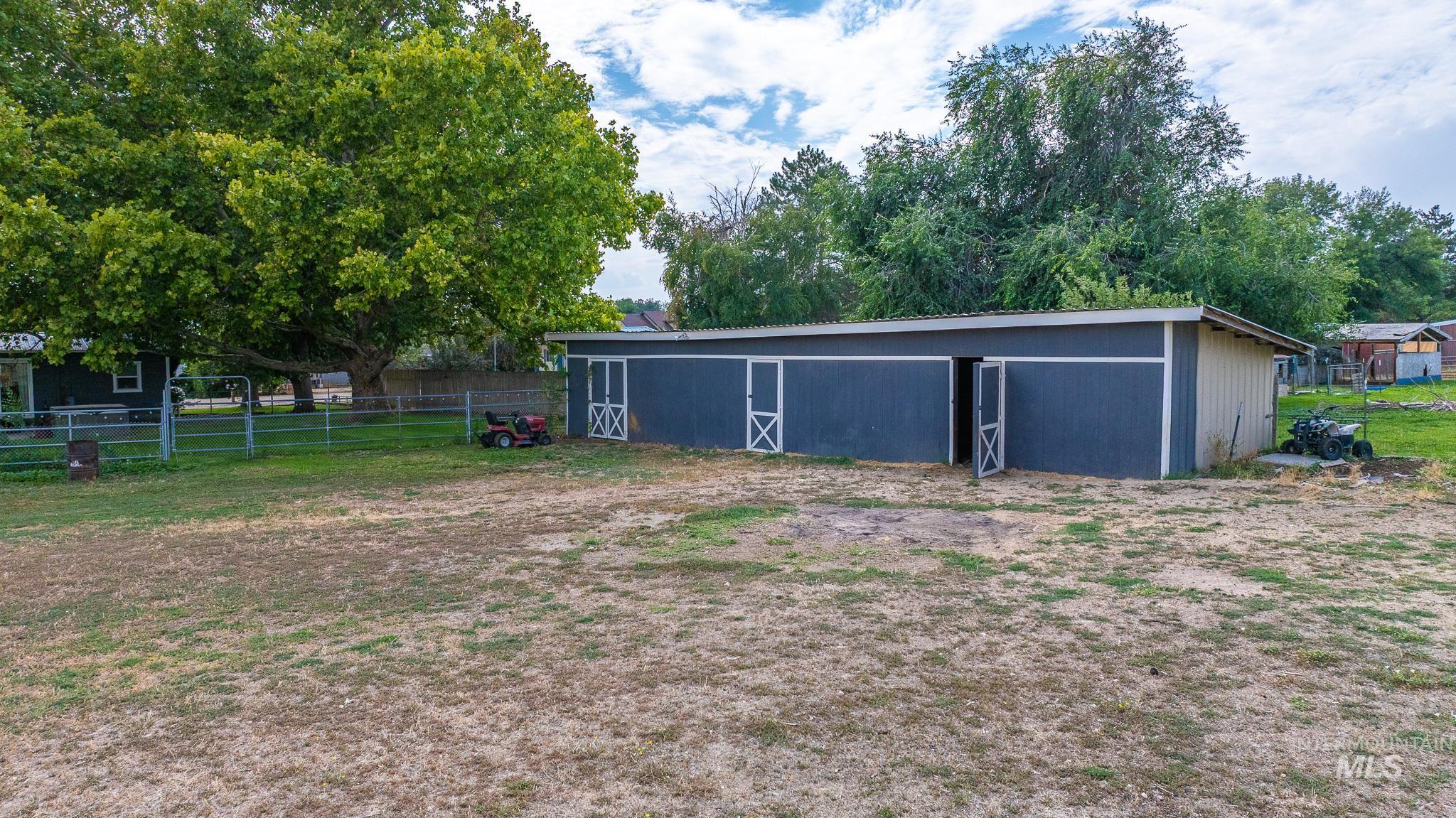 View of yard with an outbuilding