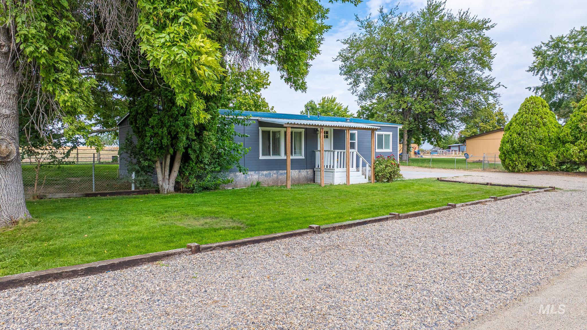 View of front of property featuring covered porch