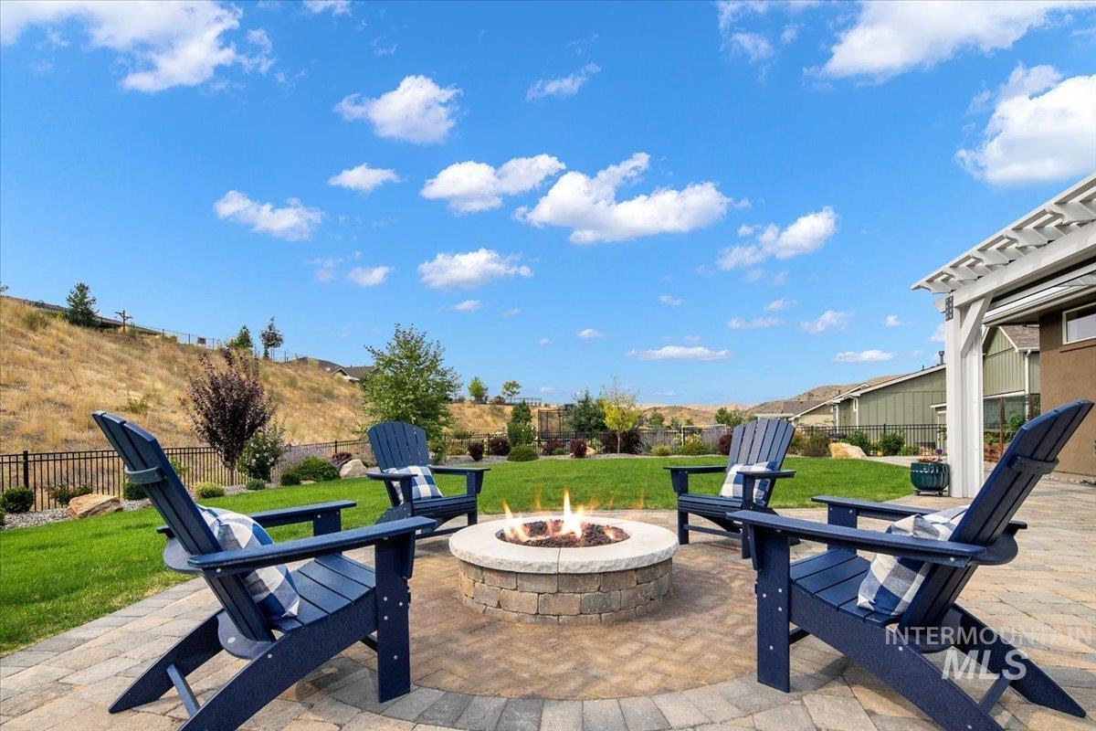 View of patio / terrace with an outdoor fire pit