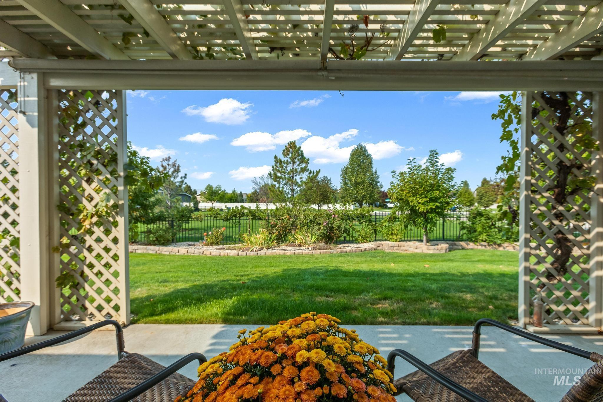View of yard featuring a pergola and a patio area