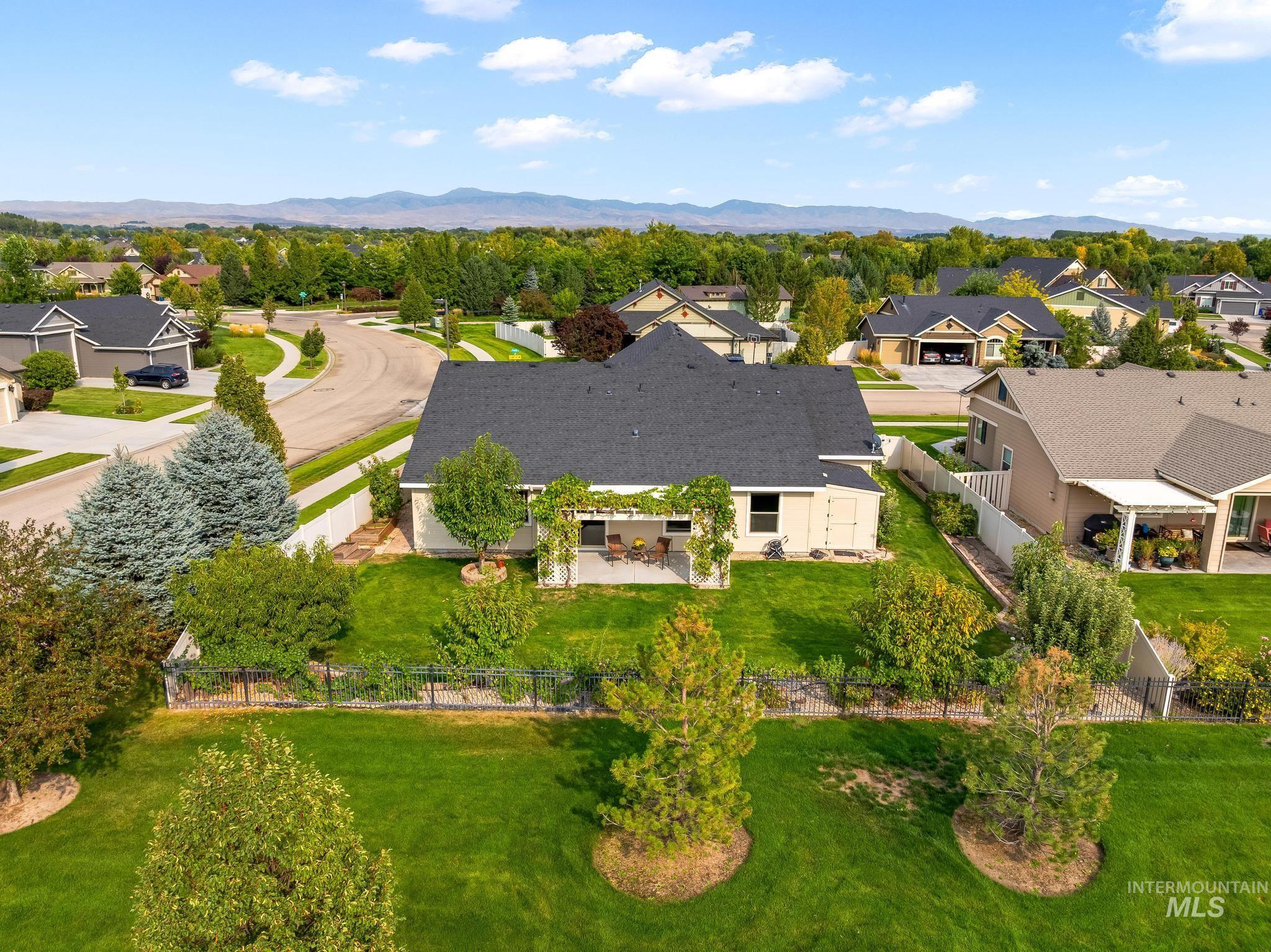 Aerial perspective of suburban area featuring mountains