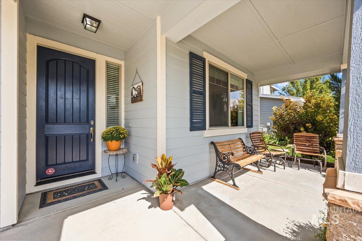 Property entrance with covered porch
