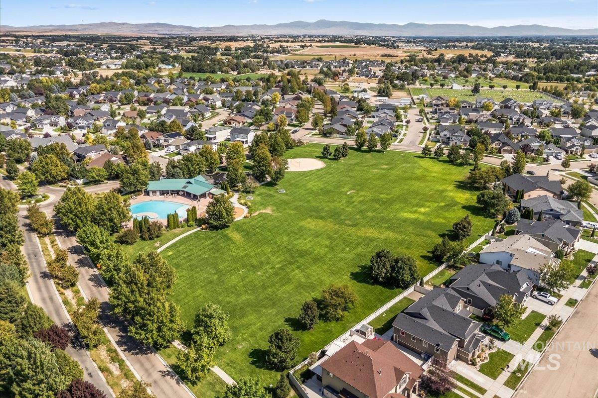 Aerial view of residential area with a mountain backdrop
