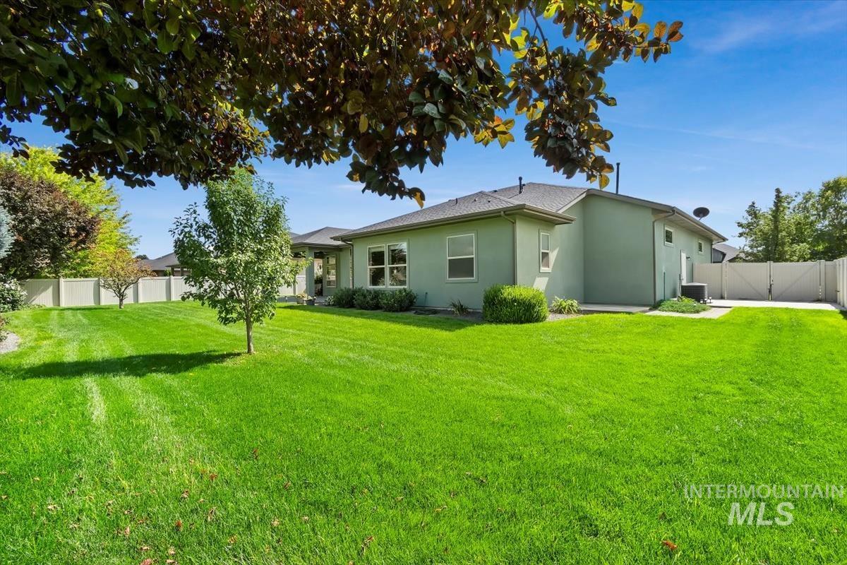 Back of property with stucco siding