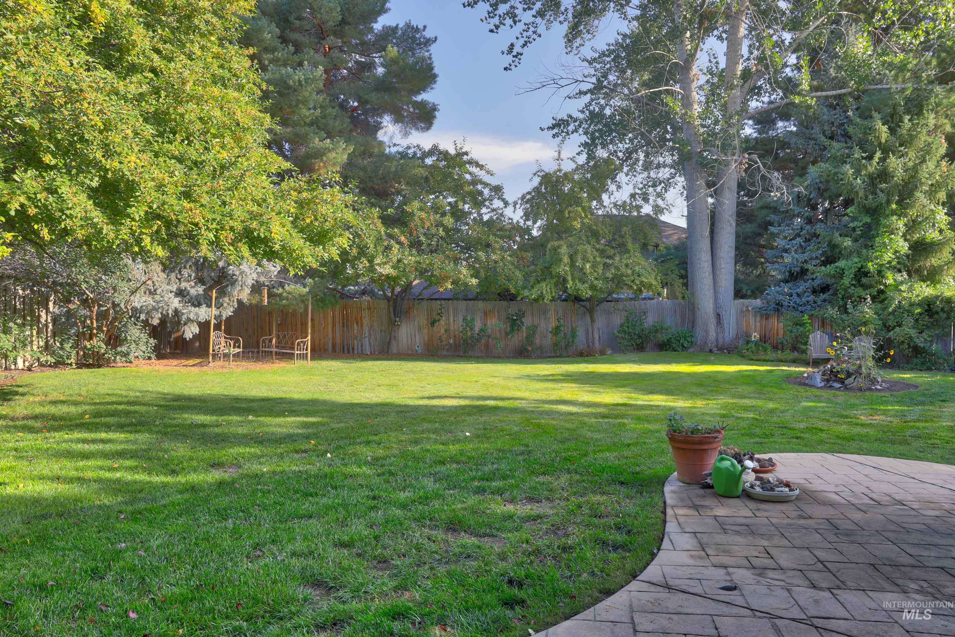 View of fenced backyard