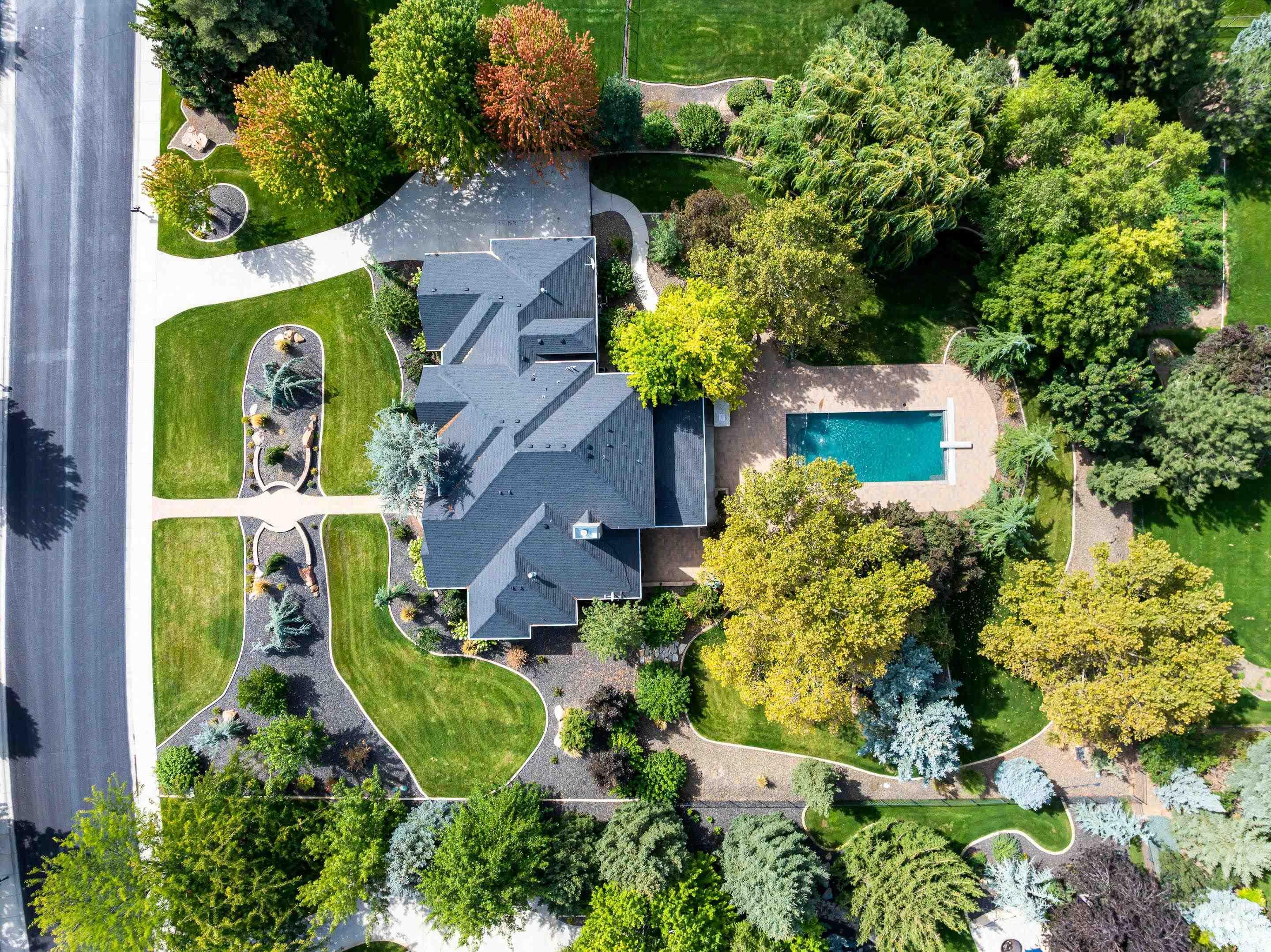 Aerial overview of property's location with a pool area