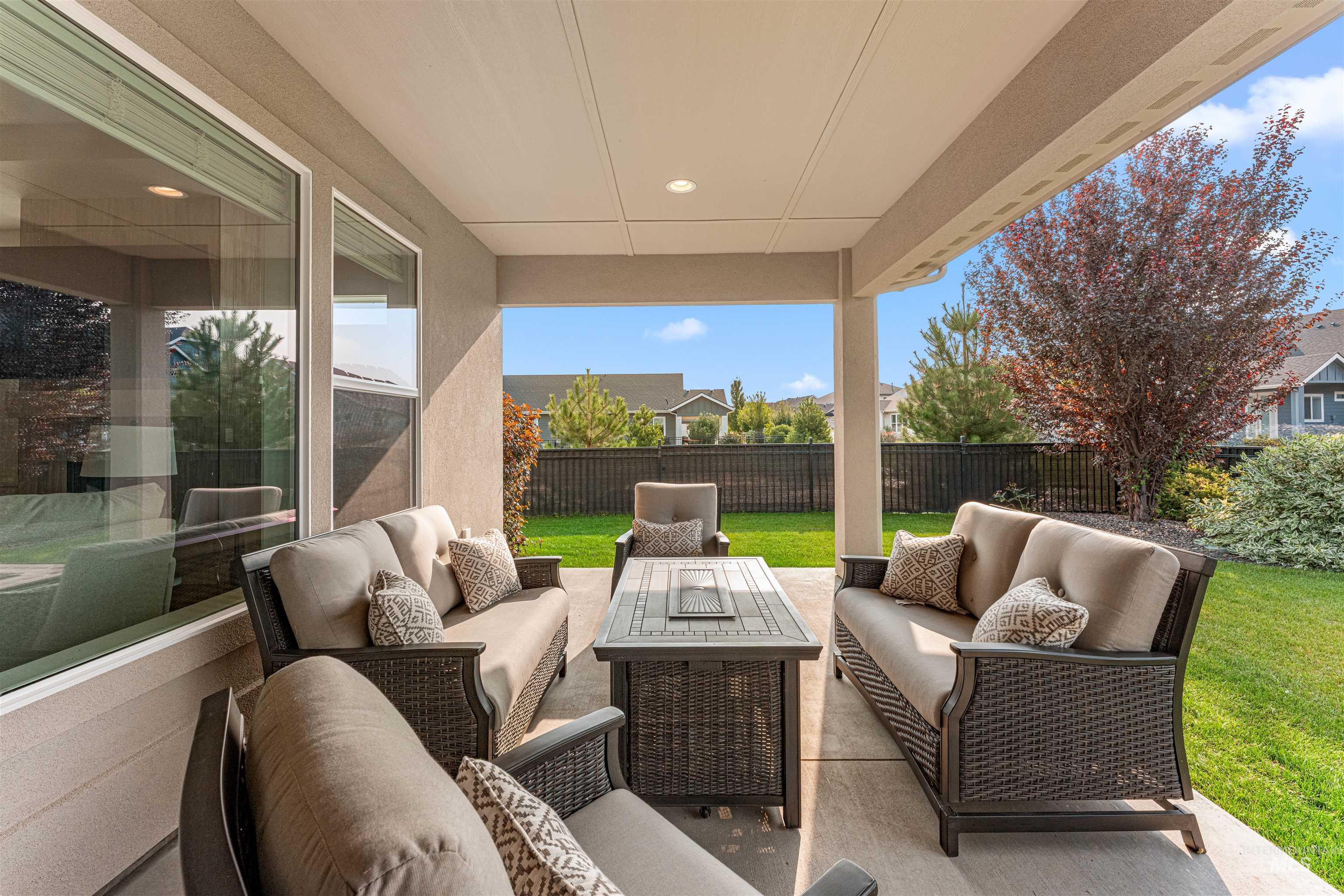 Fenced backyard featuring outdoor lounge area and a patio area