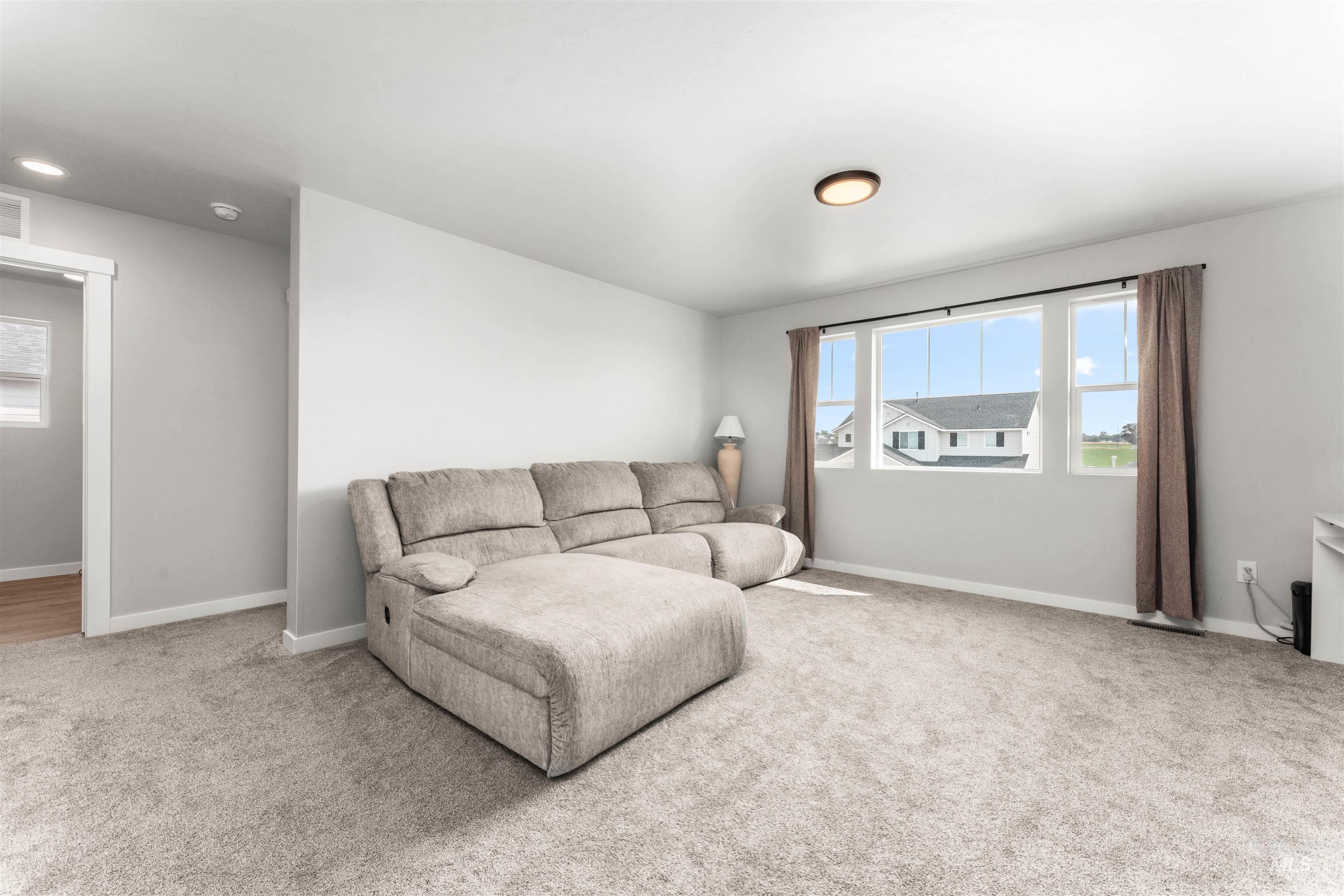 Living area featuring carpet floors