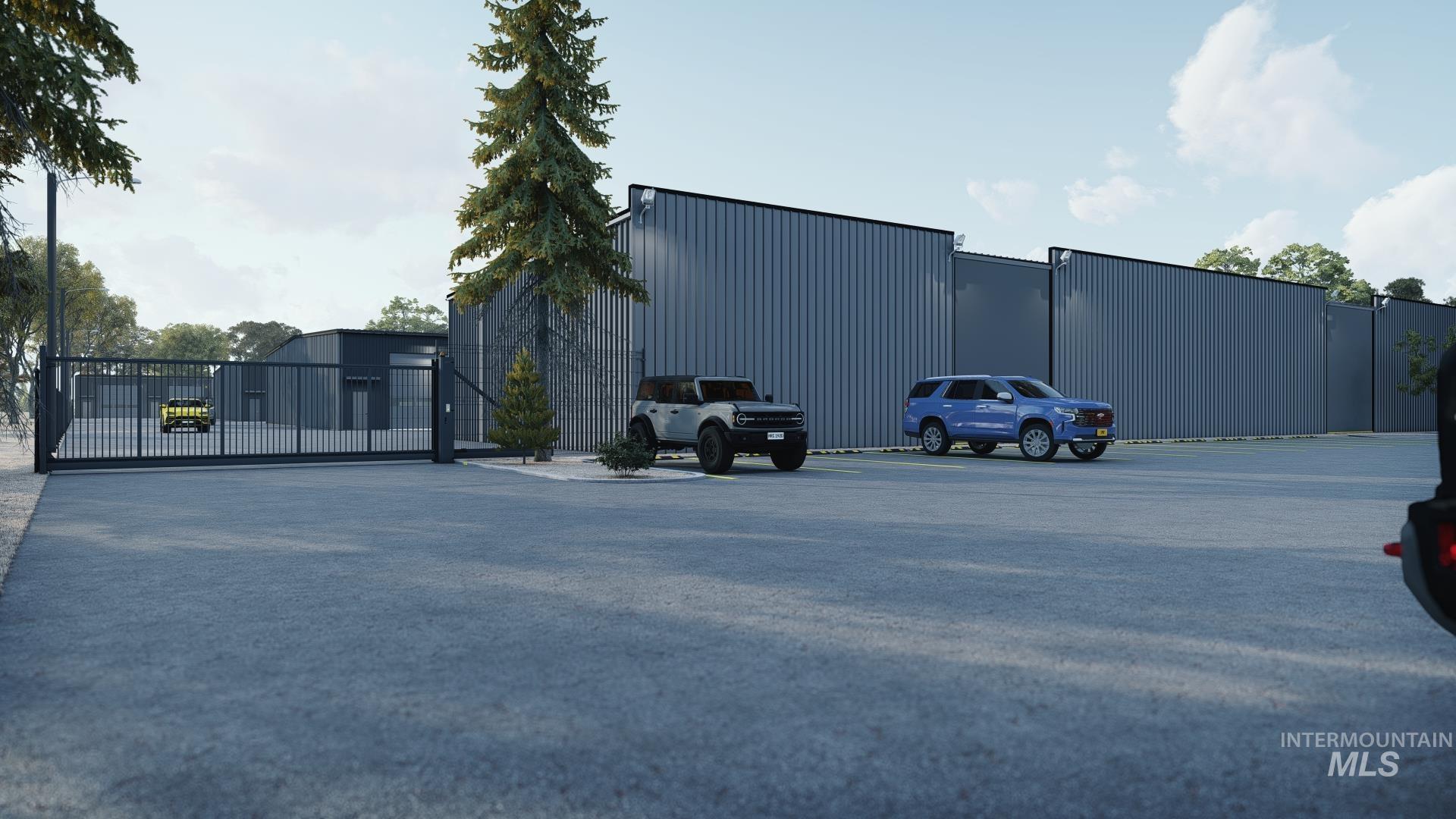 Uncovered parking lot featuring a gate