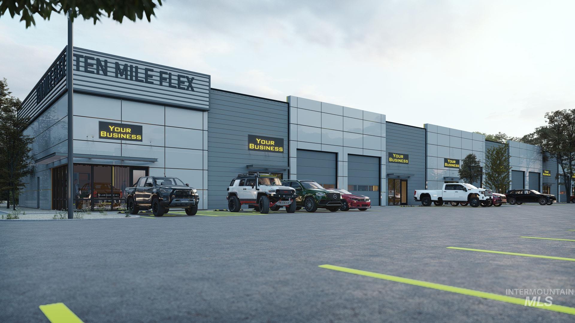 View of commercial property featuring uncovered parking