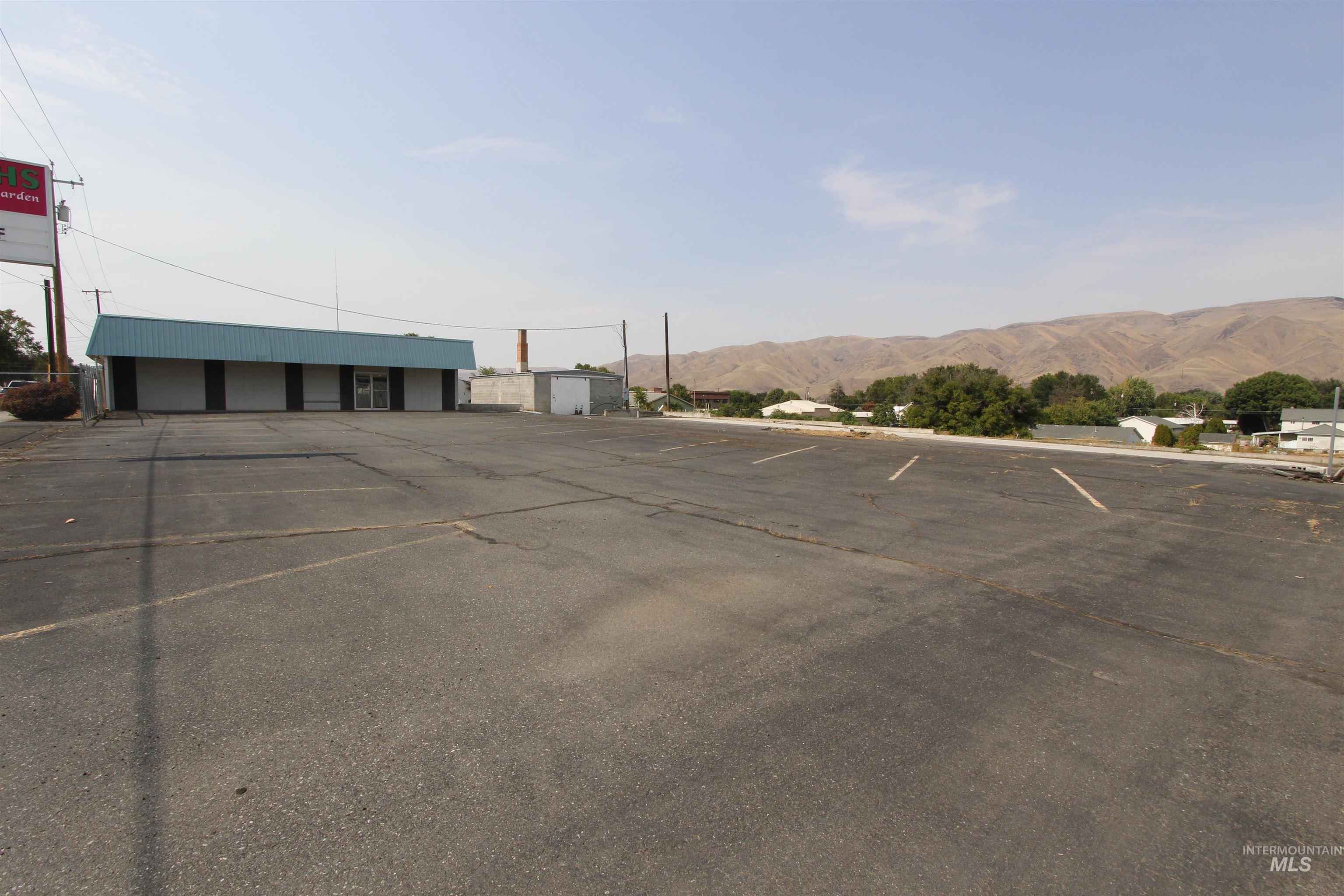 Uncovered parking lot with a mountain view