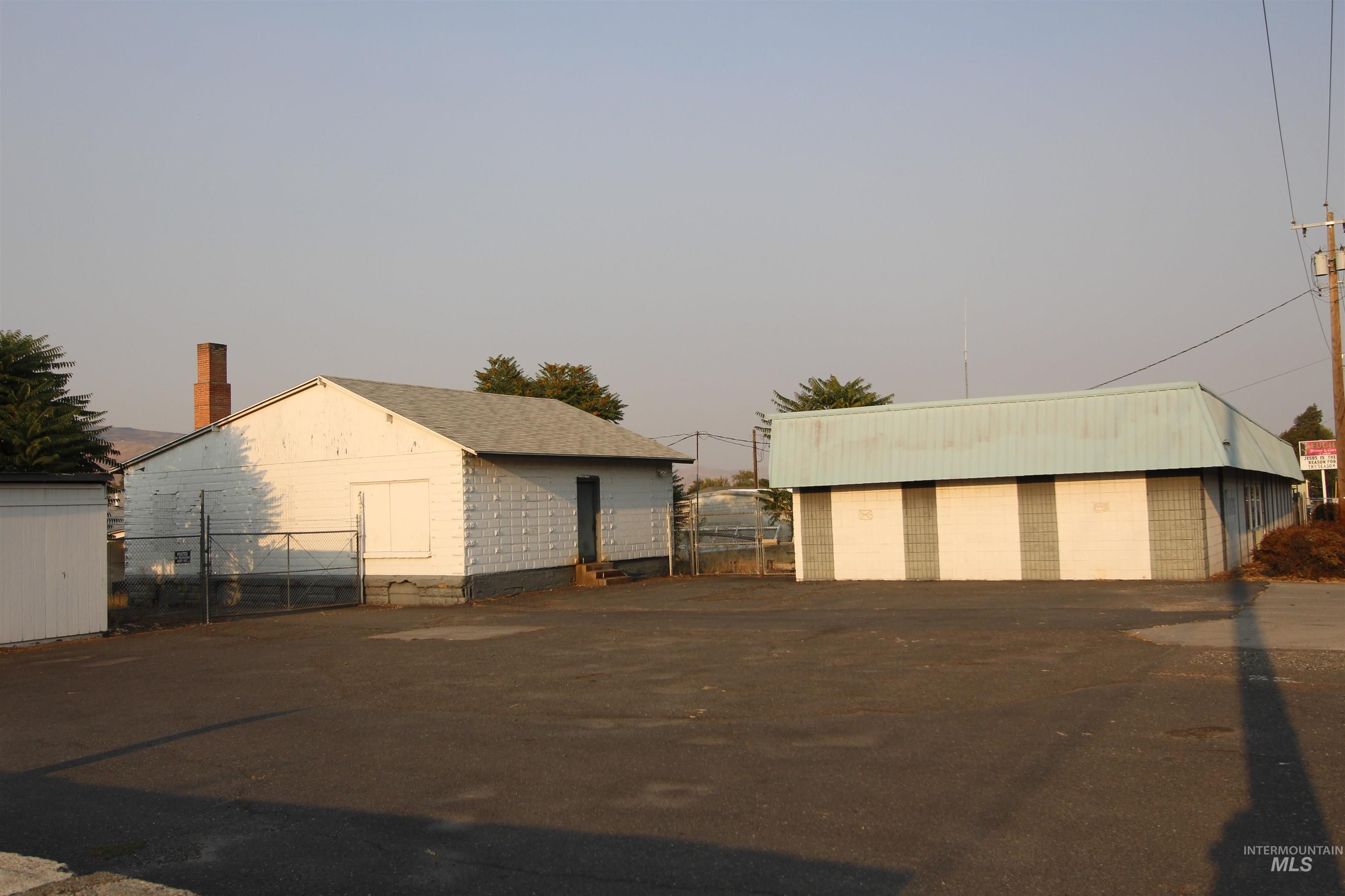 View of home's exterior featuring an outdoor structure