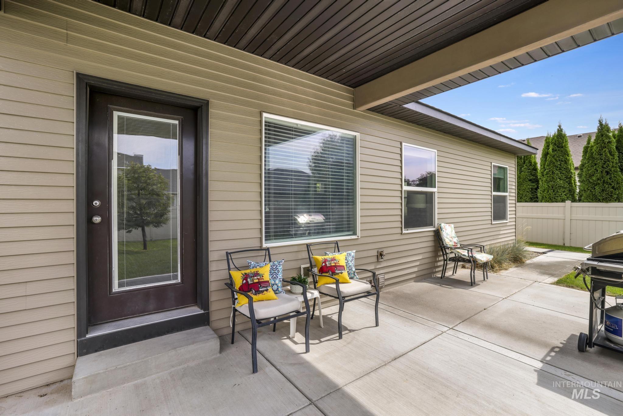 View of patio featuring area for grilling