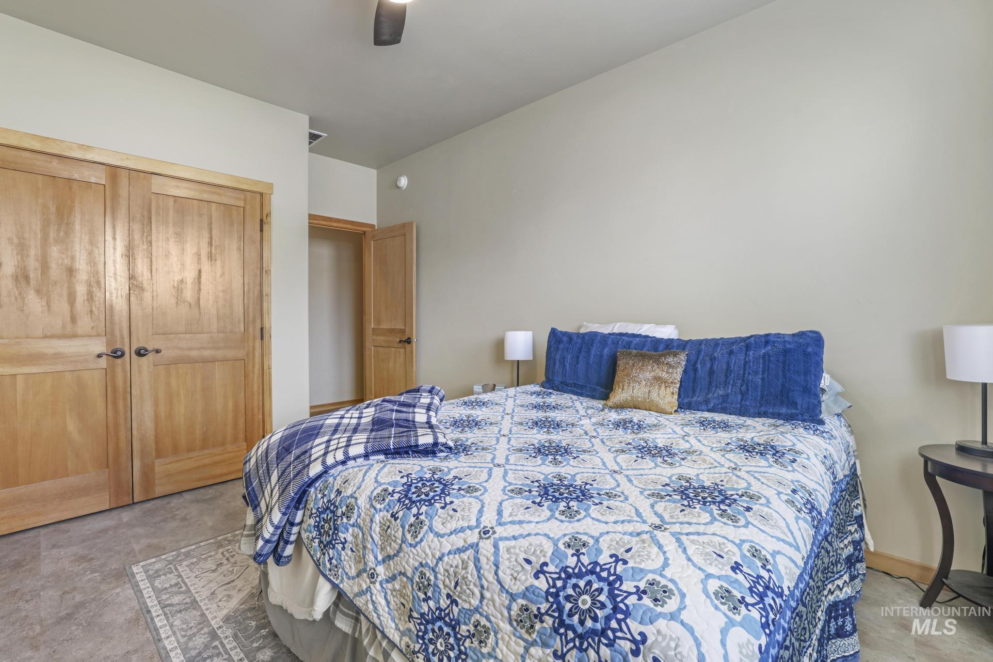 Bedroom featuring a closet and a ceiling fan