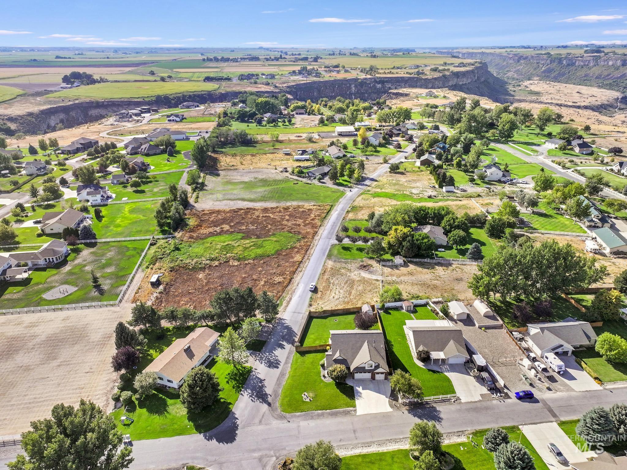 Aerial overview of property's location with nearby suburban area