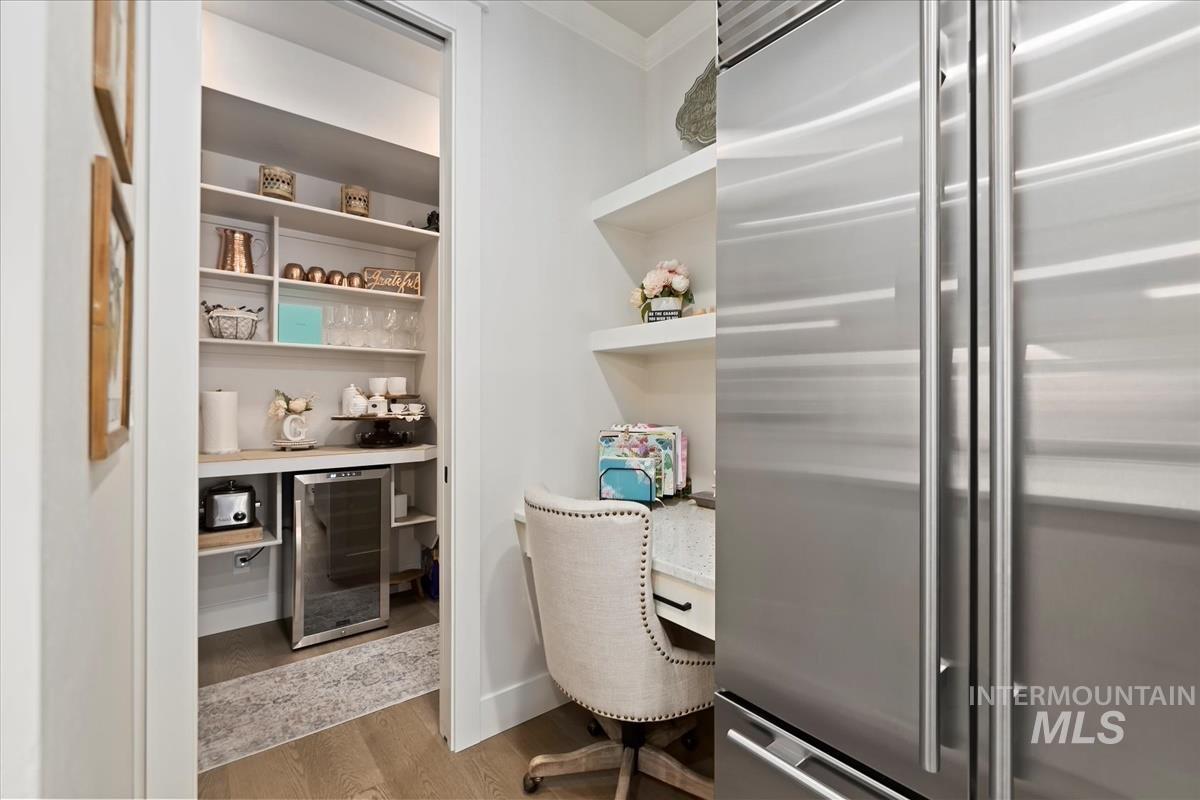 Pantry featuring beverage cooler