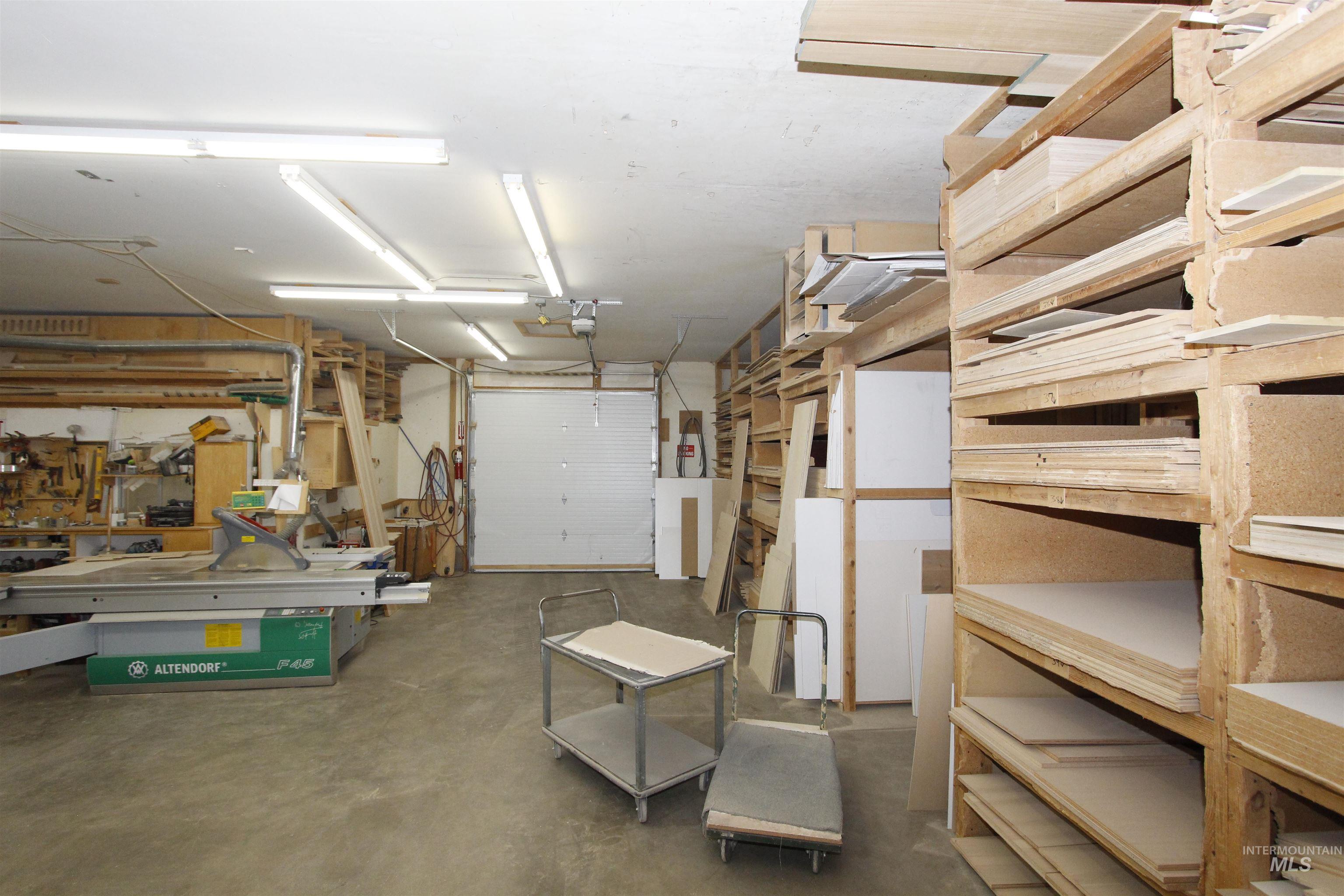 Garage featuring a workshop area