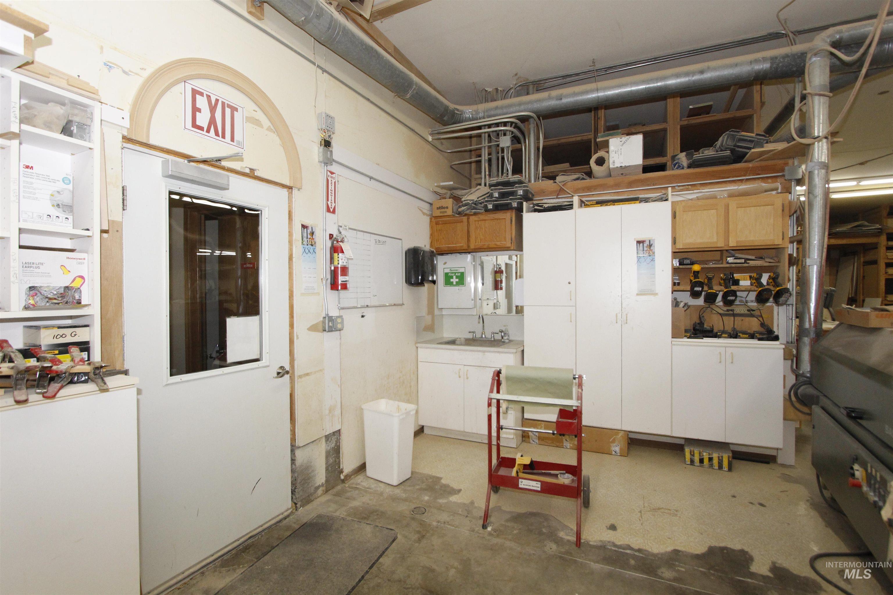 Below grade area with a sink