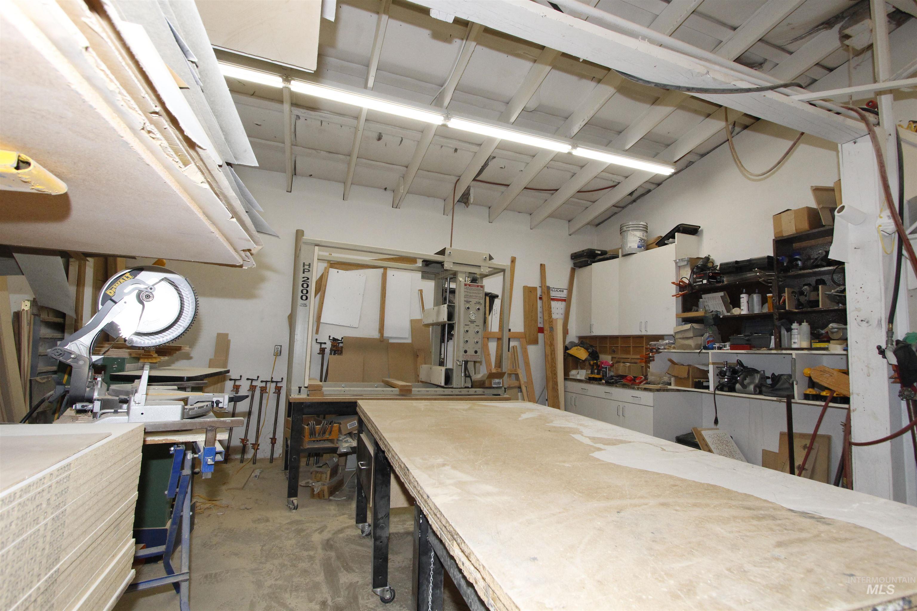 Garage featuring a workshop area