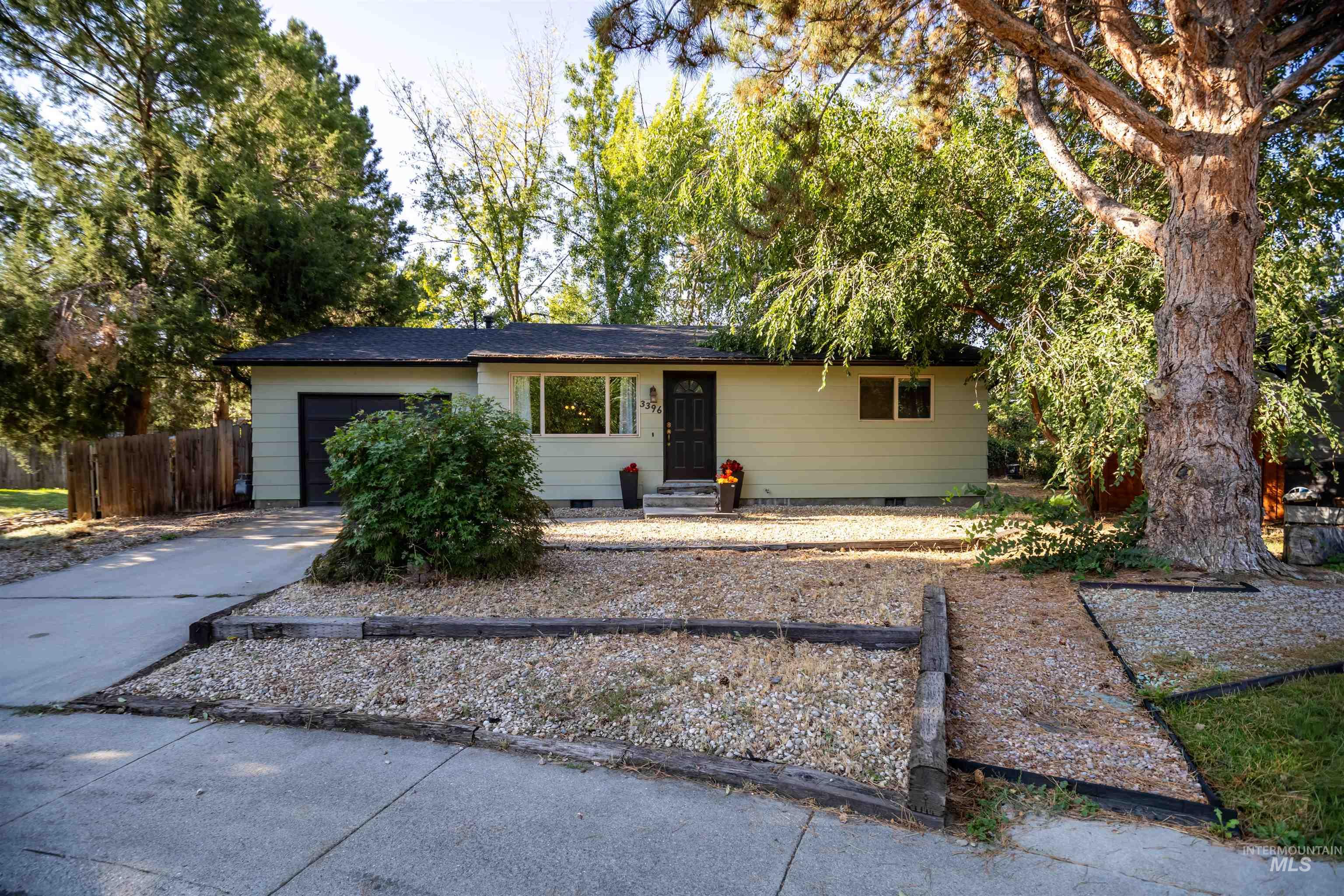 Single story home with crawl space, concrete driveway, and a garage
