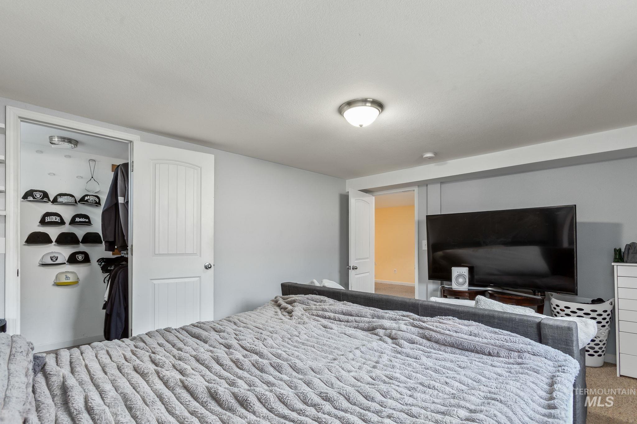 Bedroom with carpet