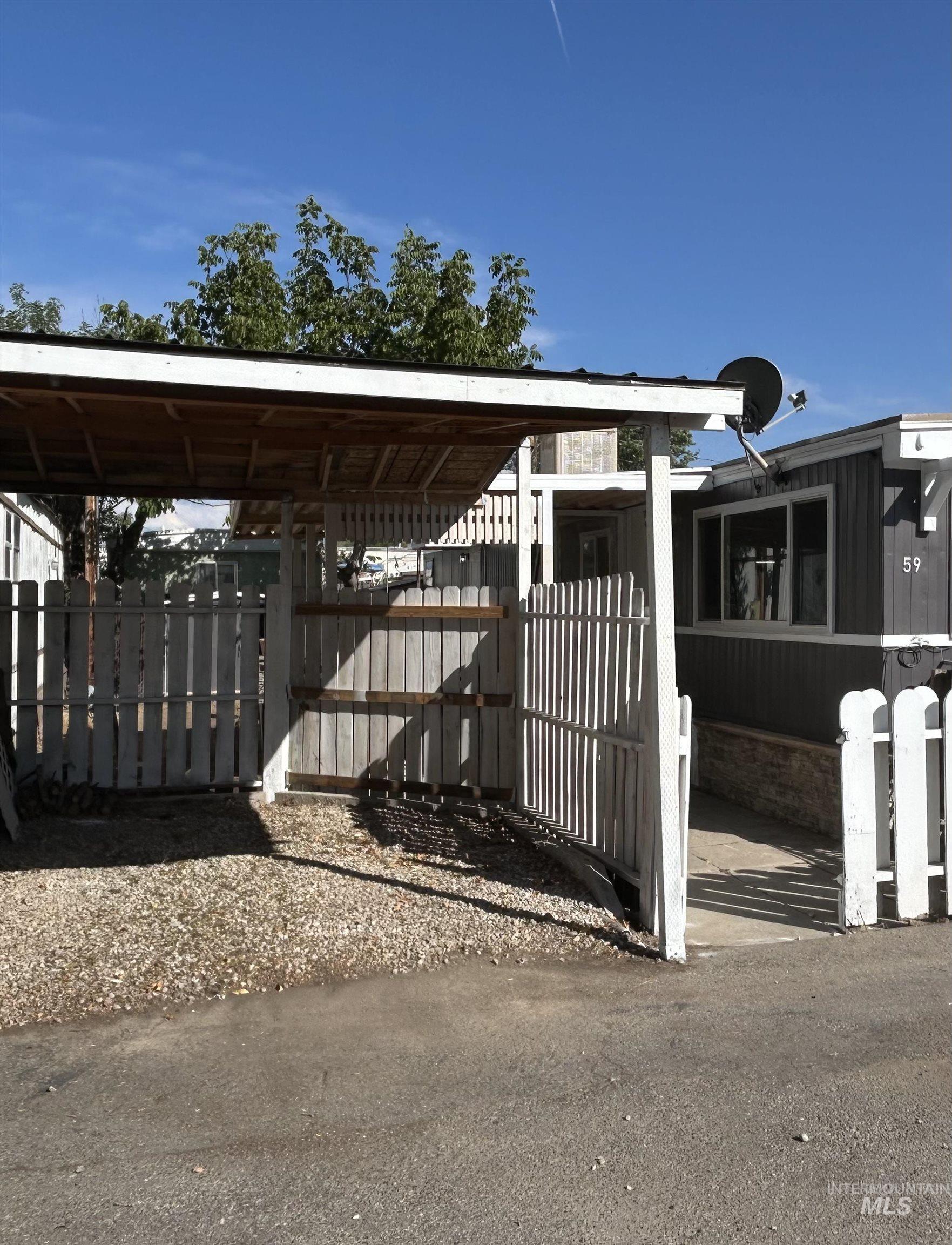 View of home's exterior featuring a gate