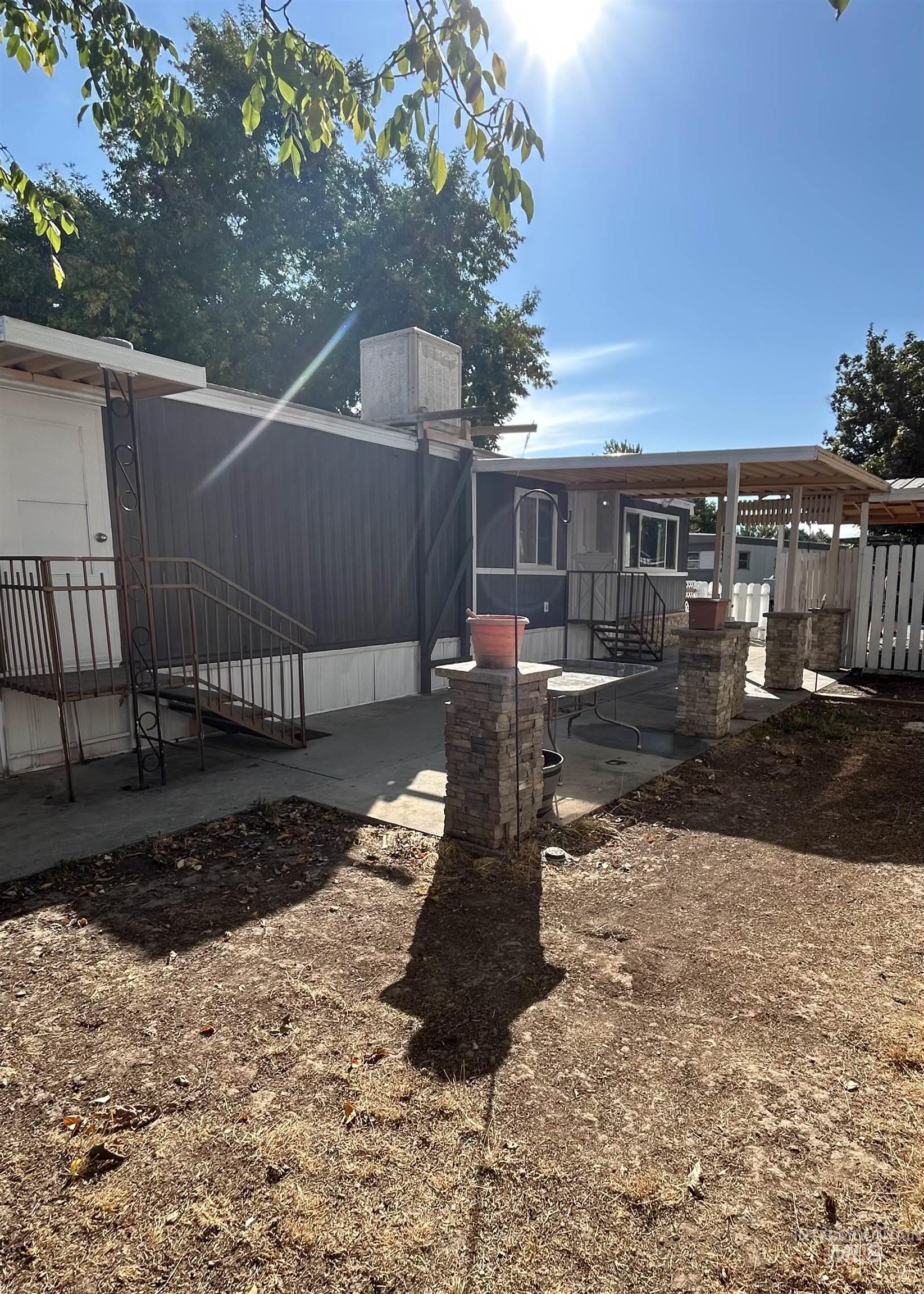 View of yard with a patio area and a gazebo