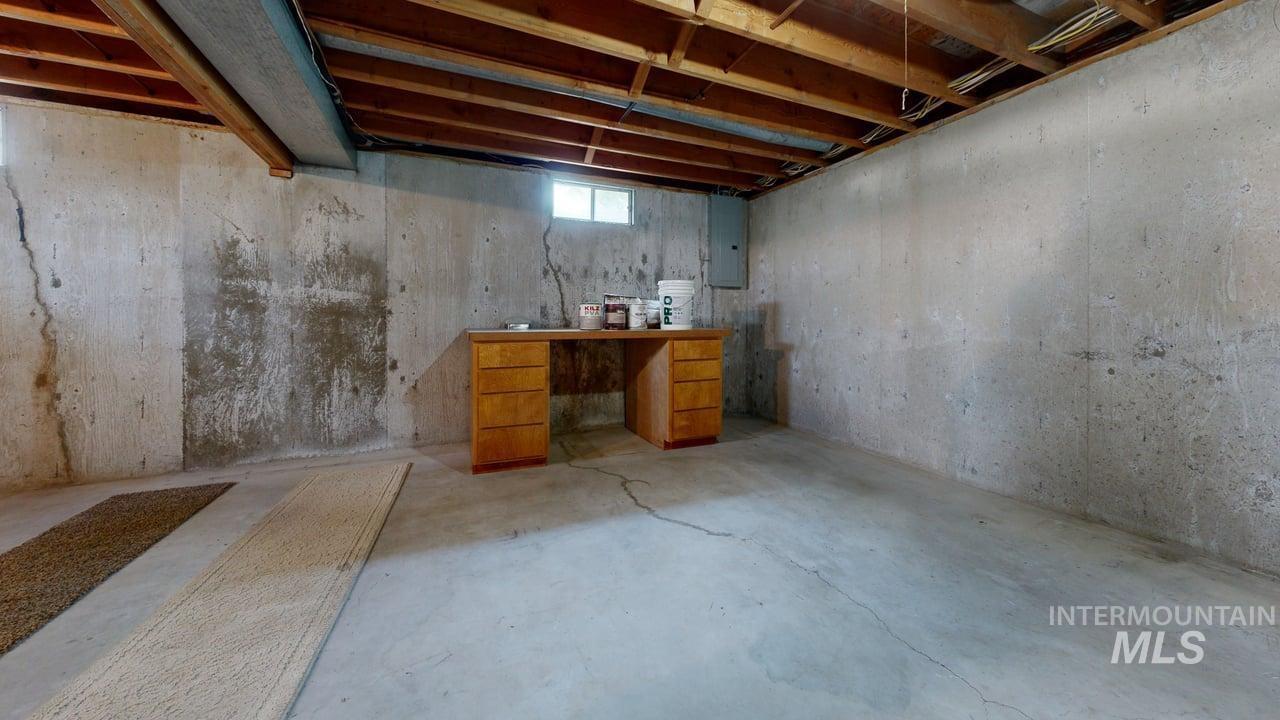 Below grade area with electric panel