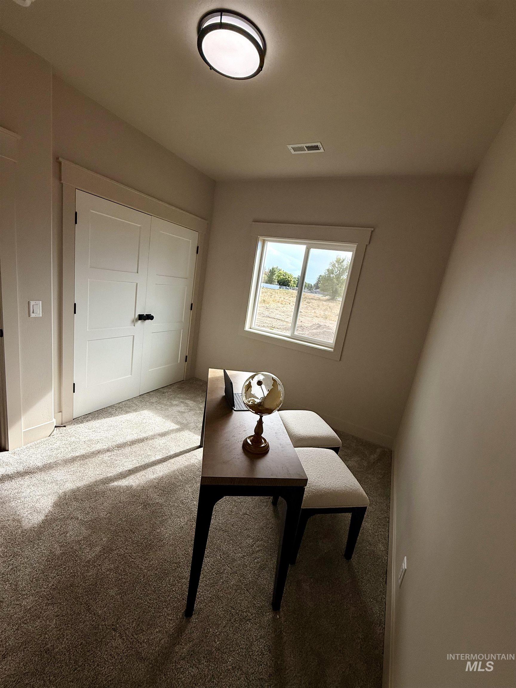 Dining area featuring carpet floors