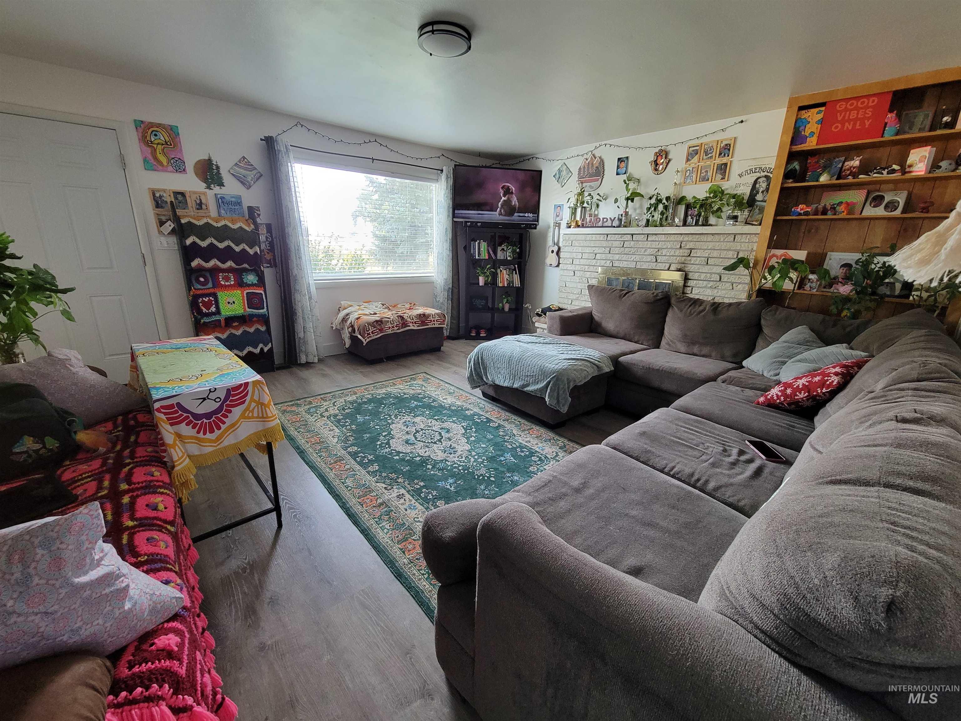 Living area with wood finished floors