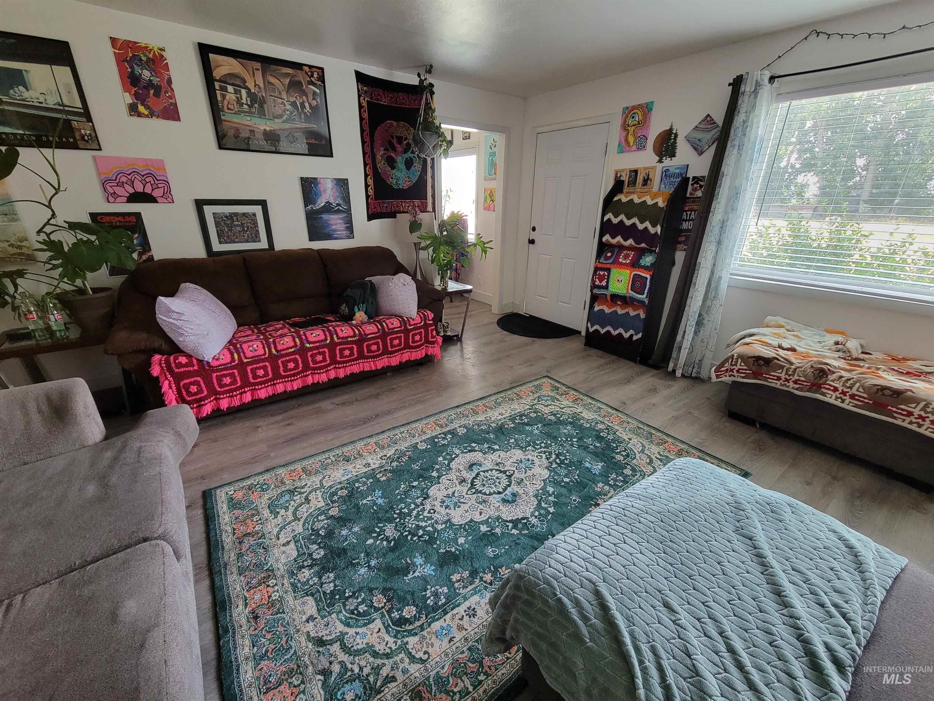 Living area with wood finished floors