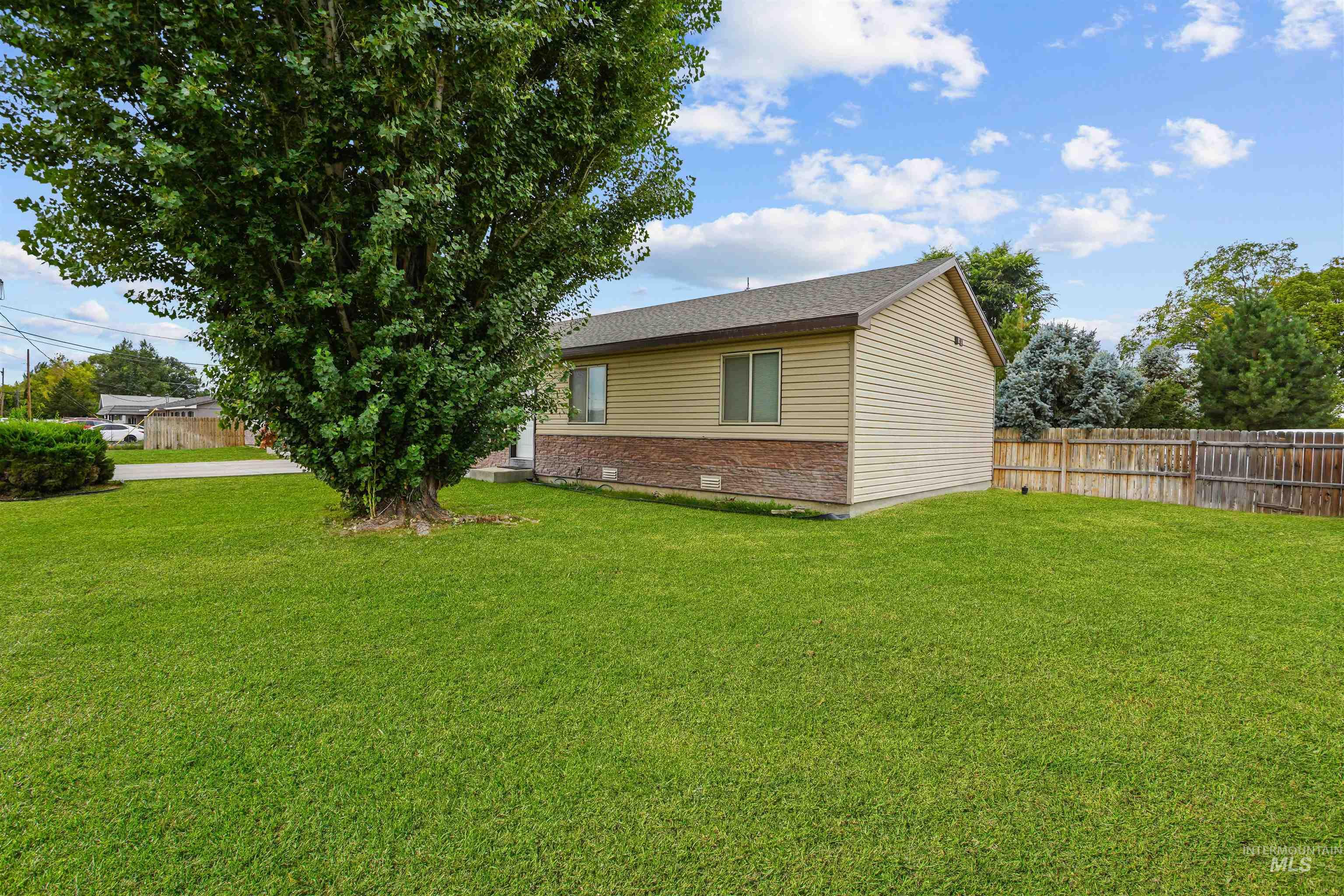 View of side of property with crawl space