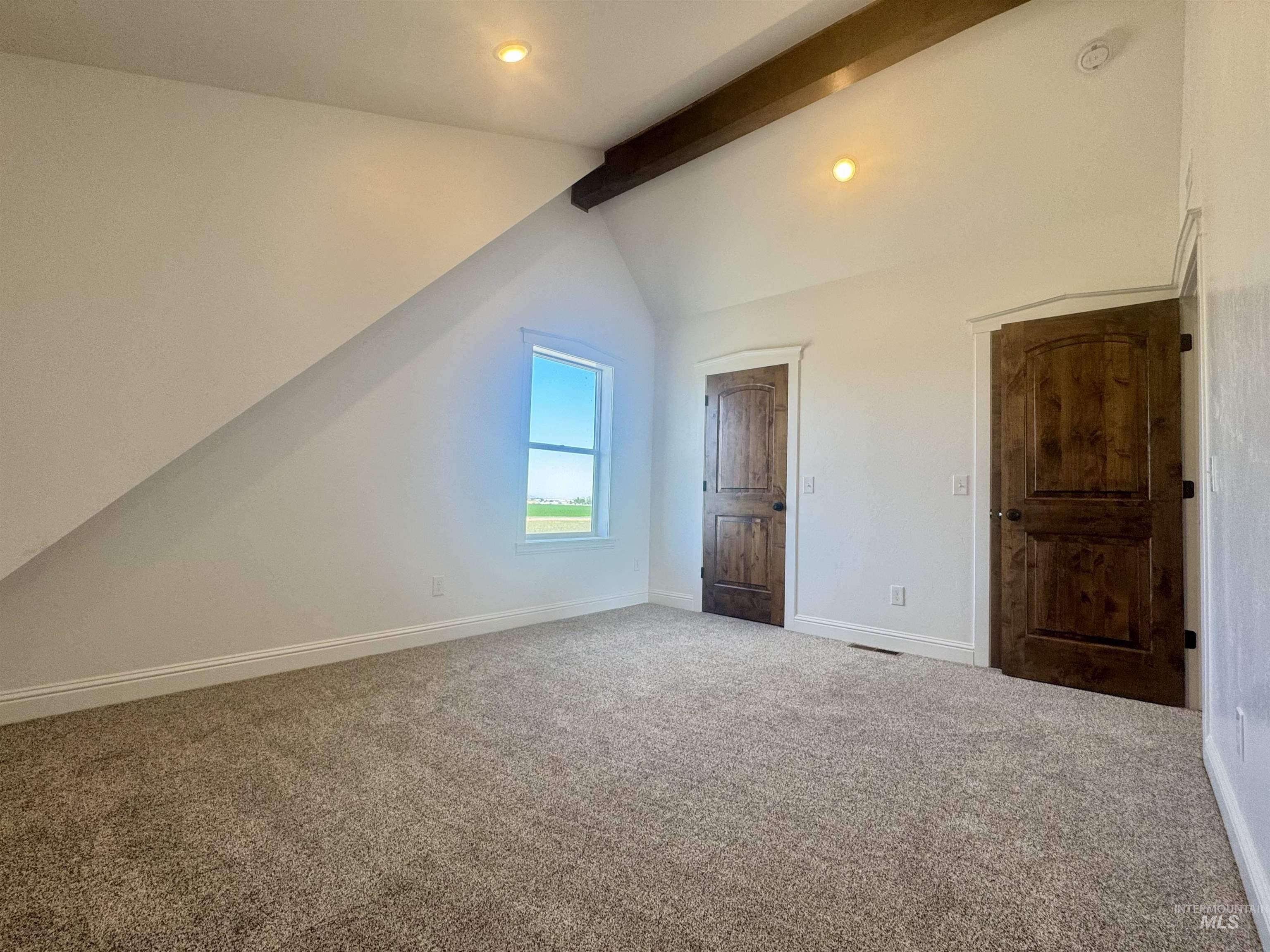 Bonus room with carpet floors, beam ceiling, high vaulted ceiling, and recessed lighting