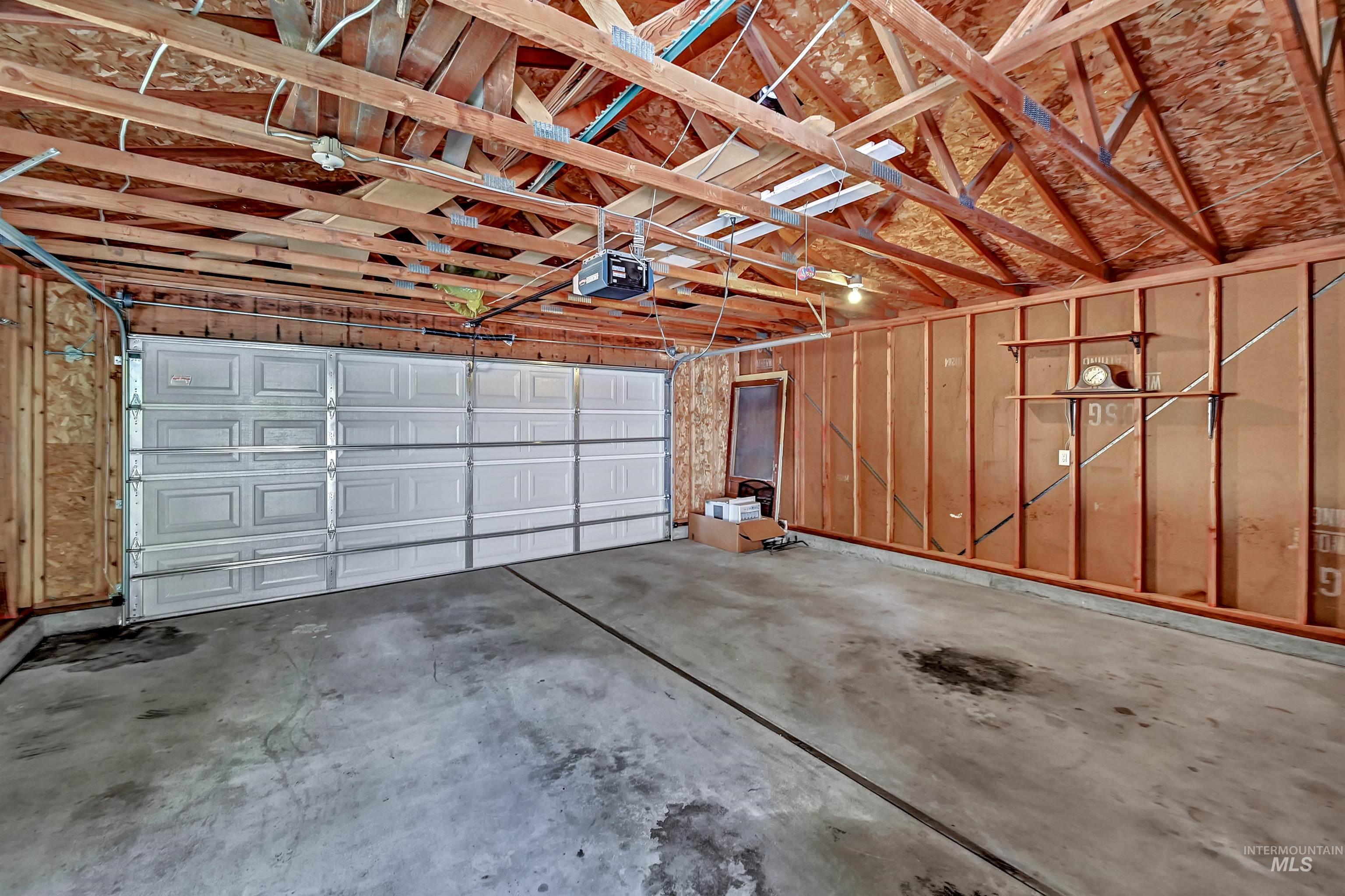 Oversized two-car garage with alley access
