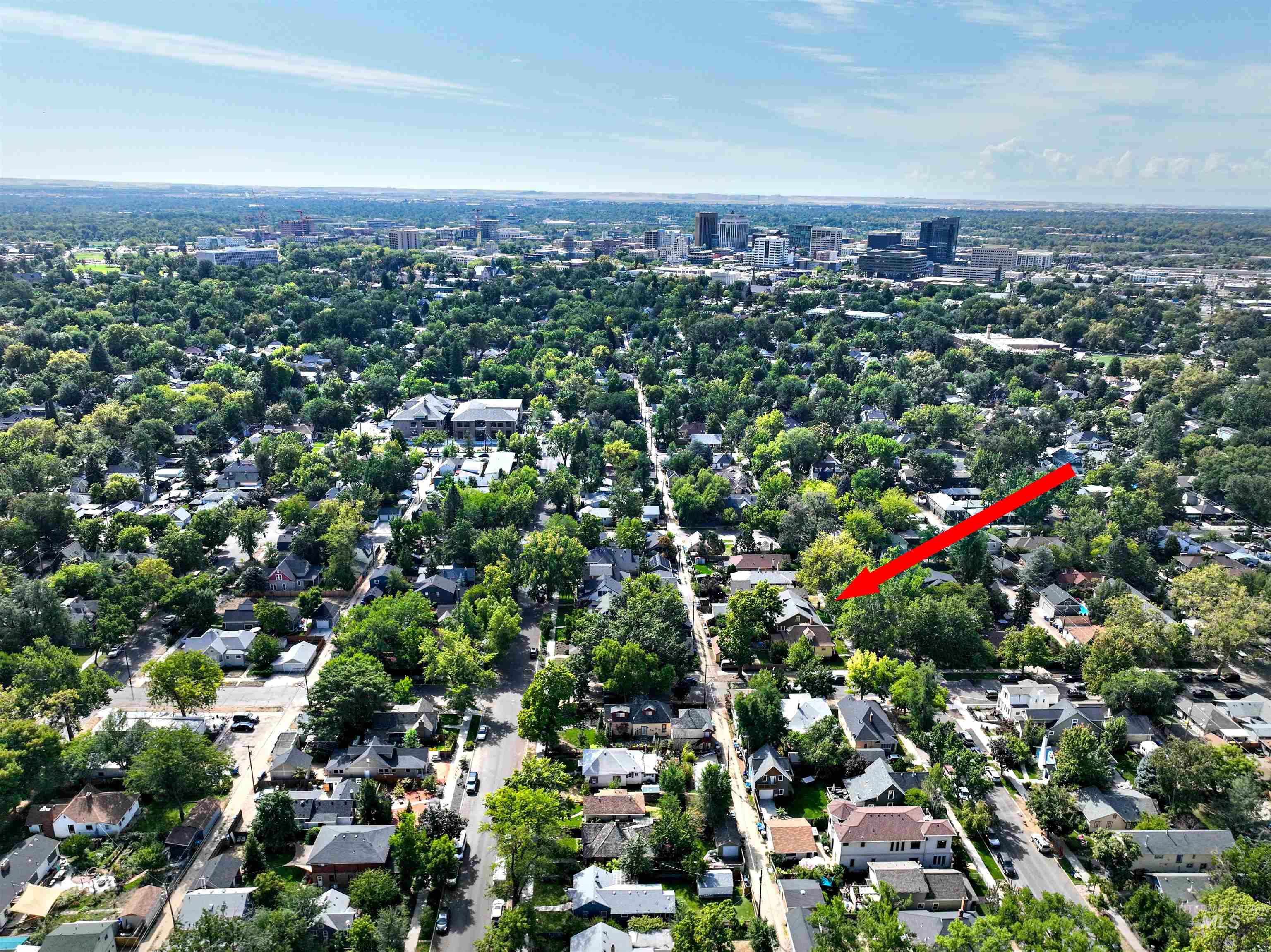 Aerial overview showing the home's location relative to downtown Boise, Hyde Park, schools, restaurants, and coffee shops