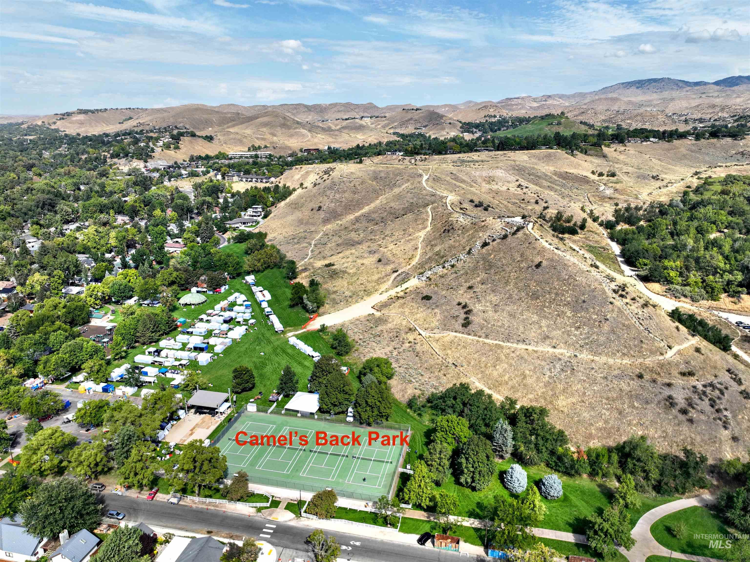 Aerial overview showing the home's location relative to Camel's Back Park and foothills trails