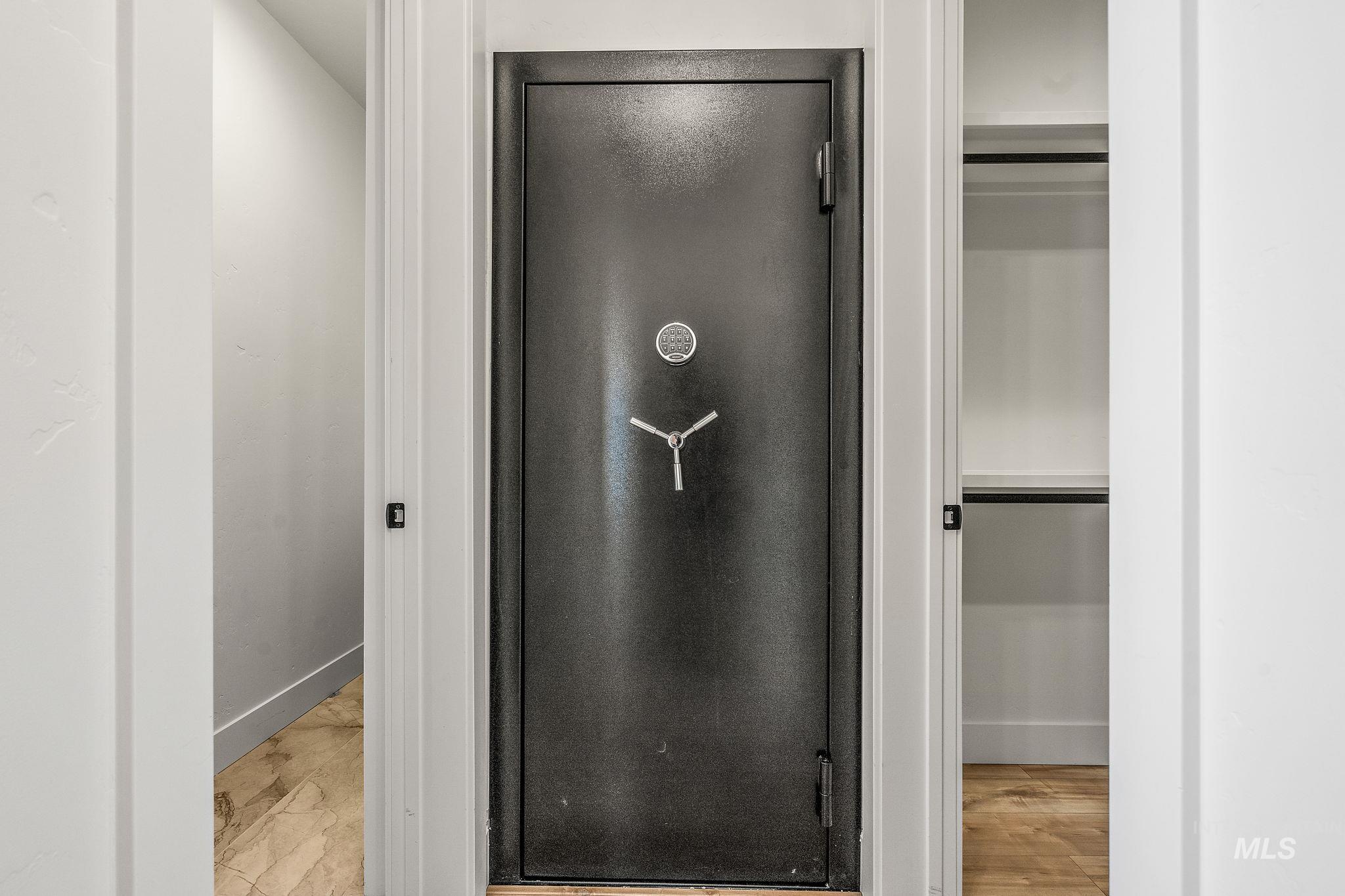 Full bathroom with a walk in closet and a shower stall