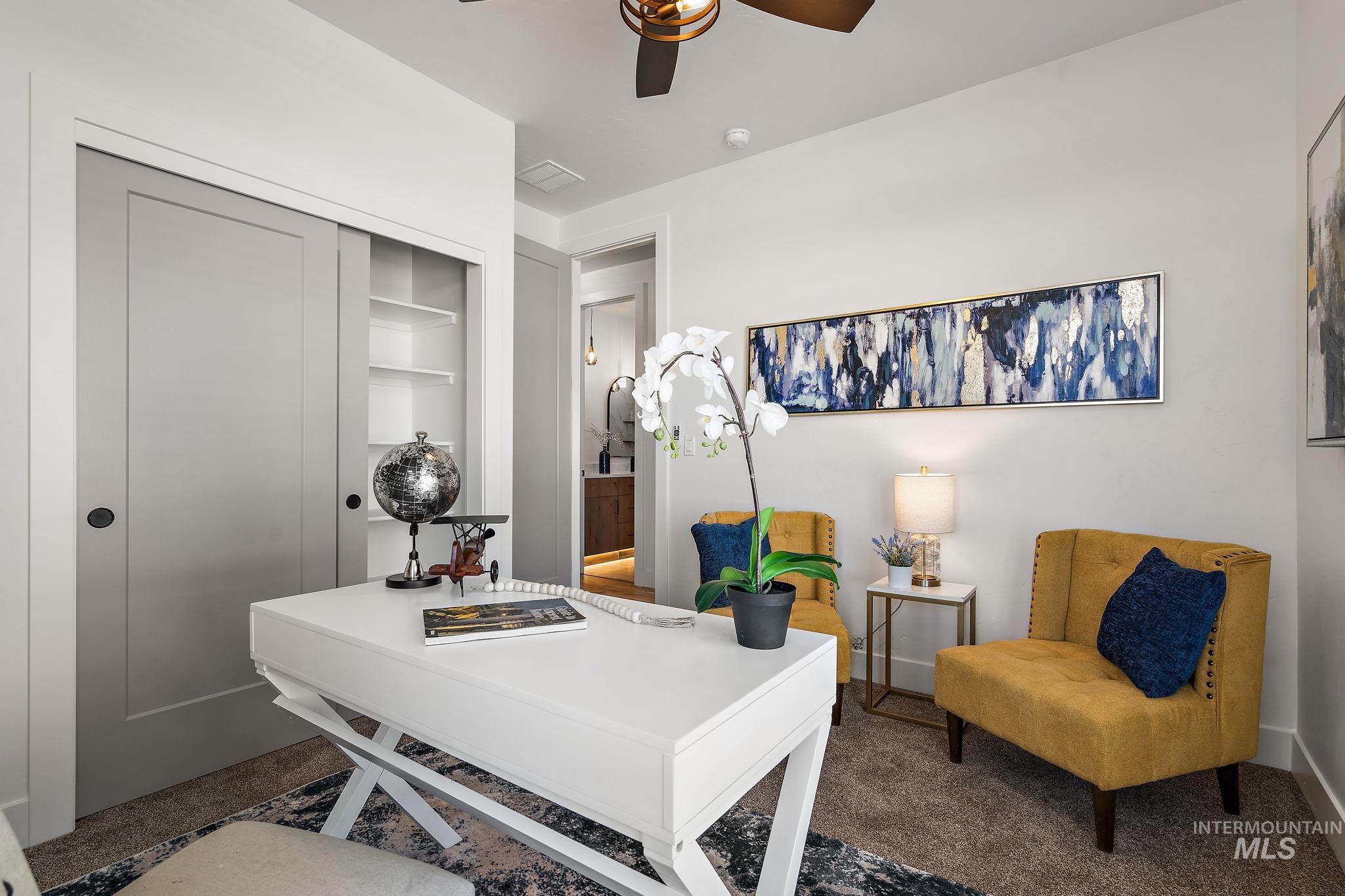 Office featuring carpet flooring and ceiling fan