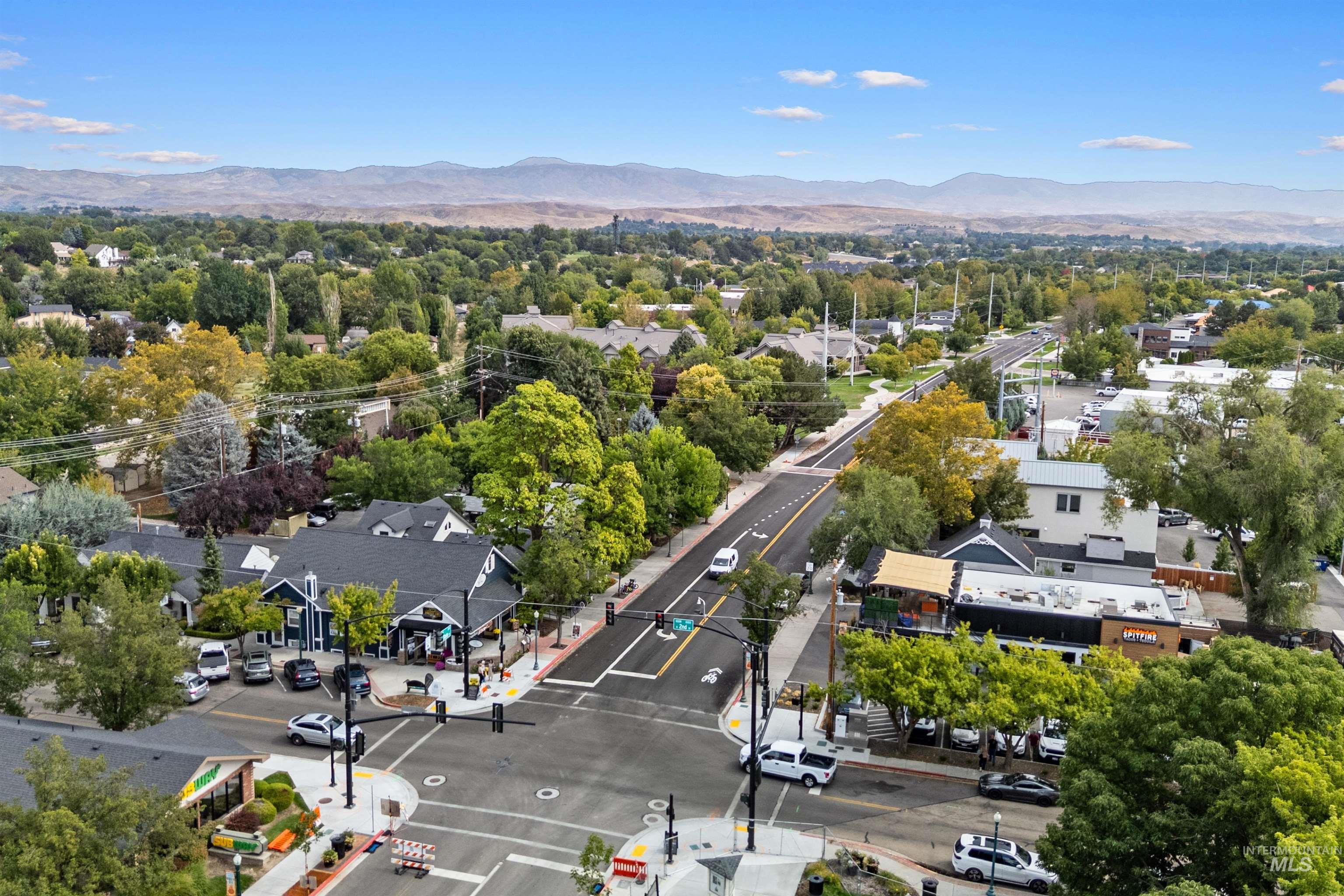 Aerial perspective of suburban area featuring mountains