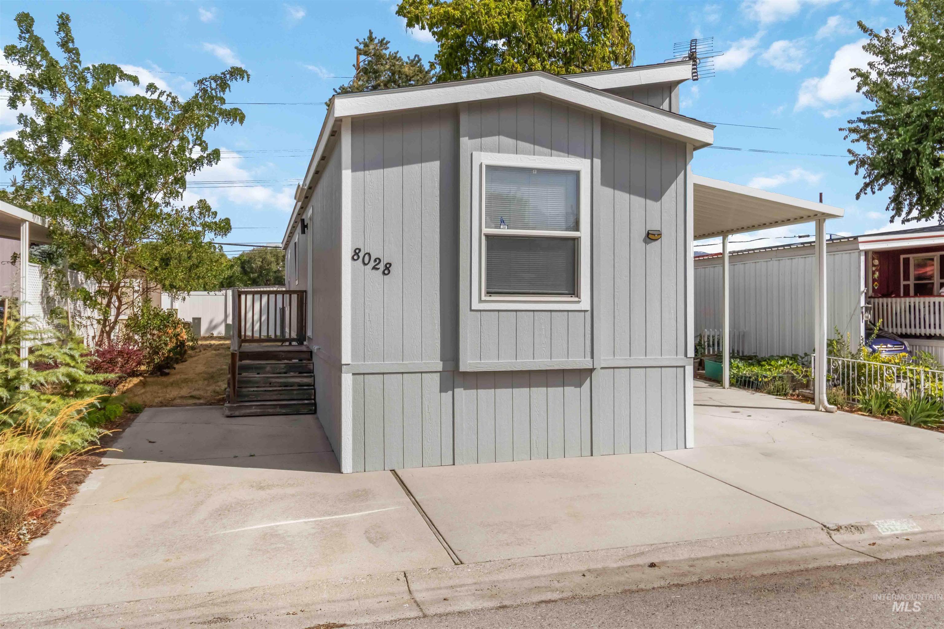 View of outdoor structure with a carport
