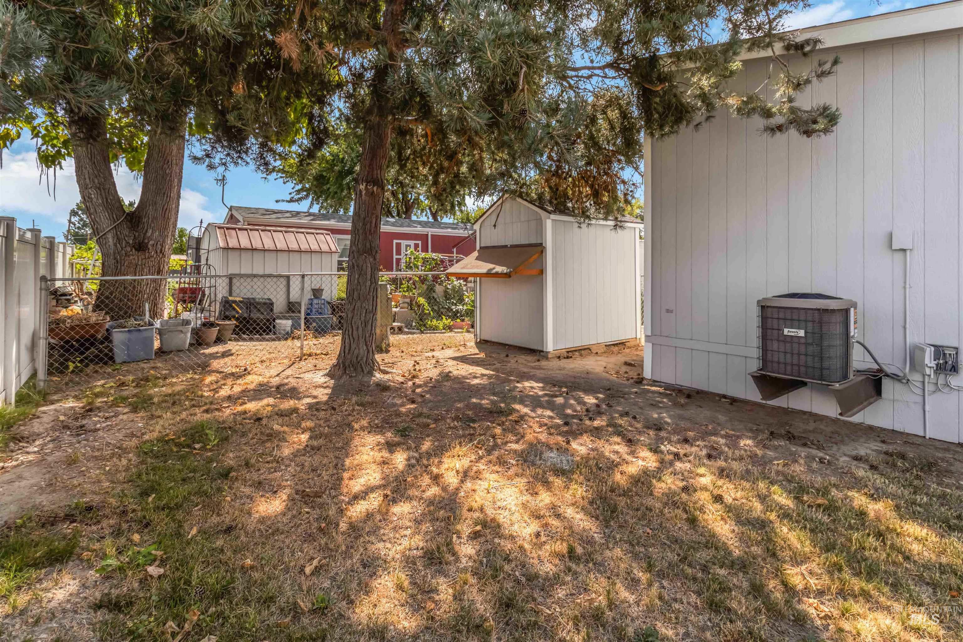 View of yard with an outbuilding