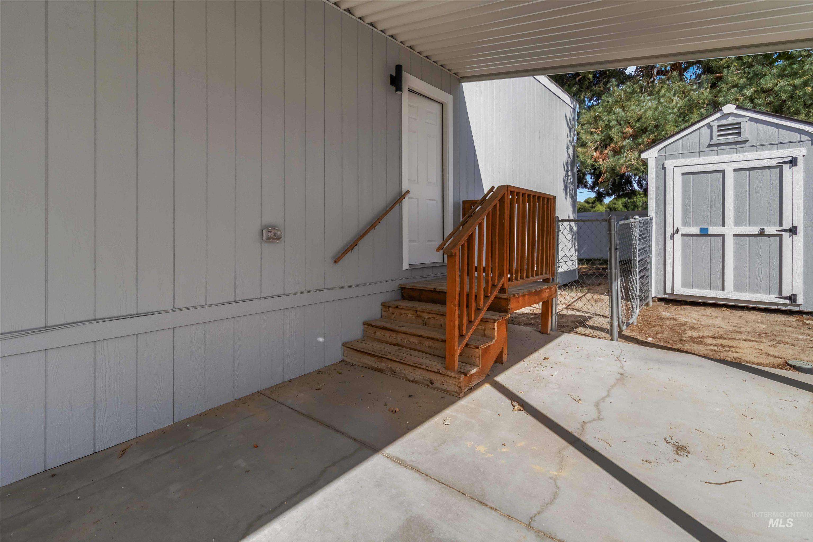Doorway to property with a patio