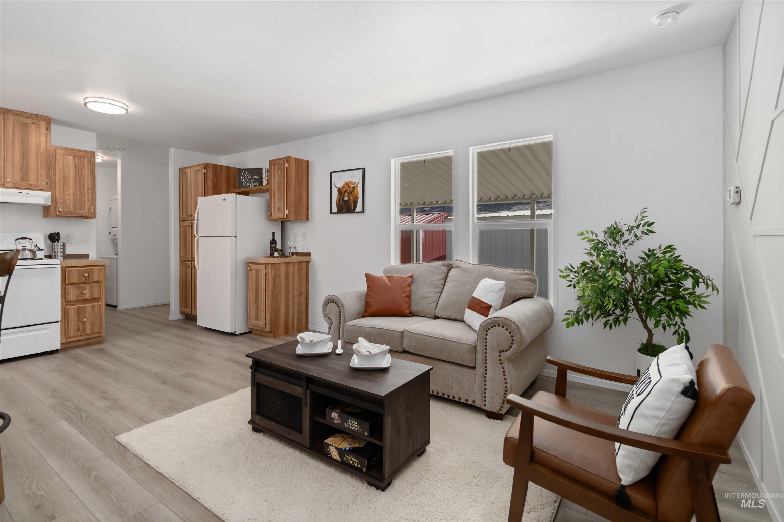 Living area featuring light wood finished floors