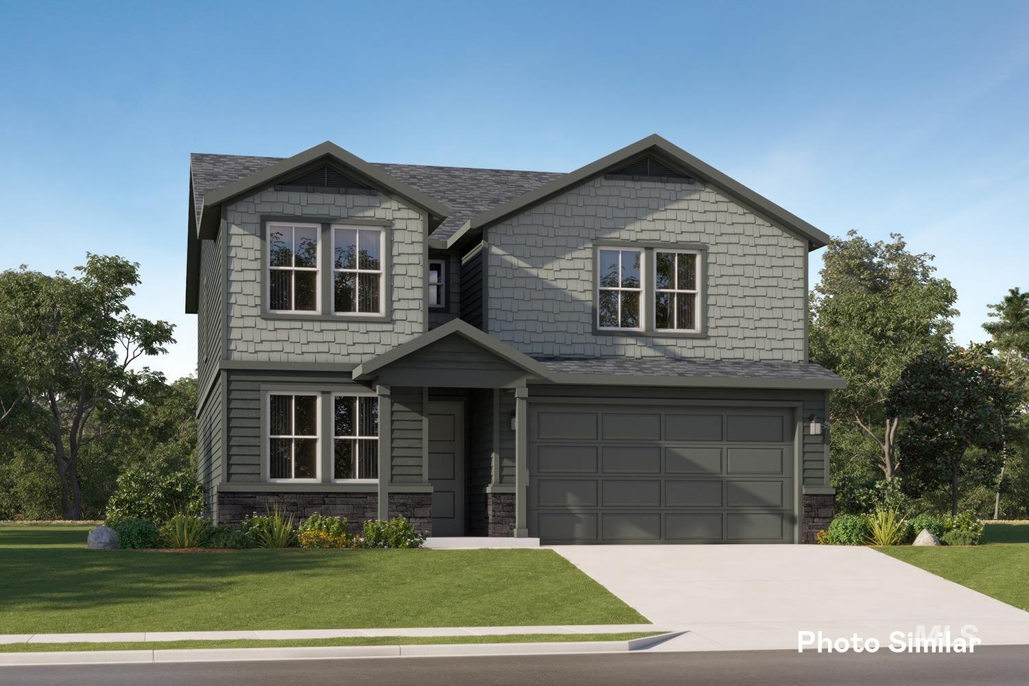 Craftsman-style home featuring stone siding, an attached garage, driveway, and a front yard