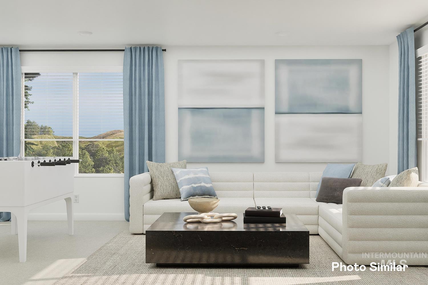 Carpeted living room featuring healthy amount of natural light