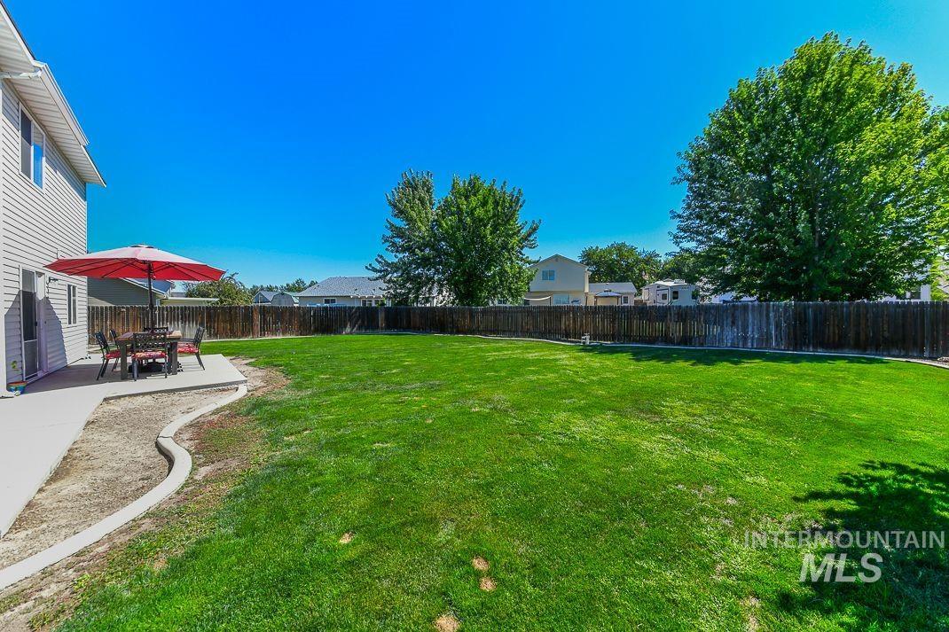 Fenced quarter acre backyard