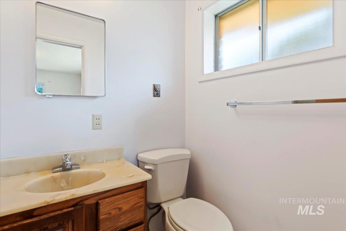 Bathroom with vanity and toilet