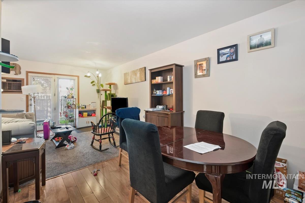 Dining space featuring wood finished floors