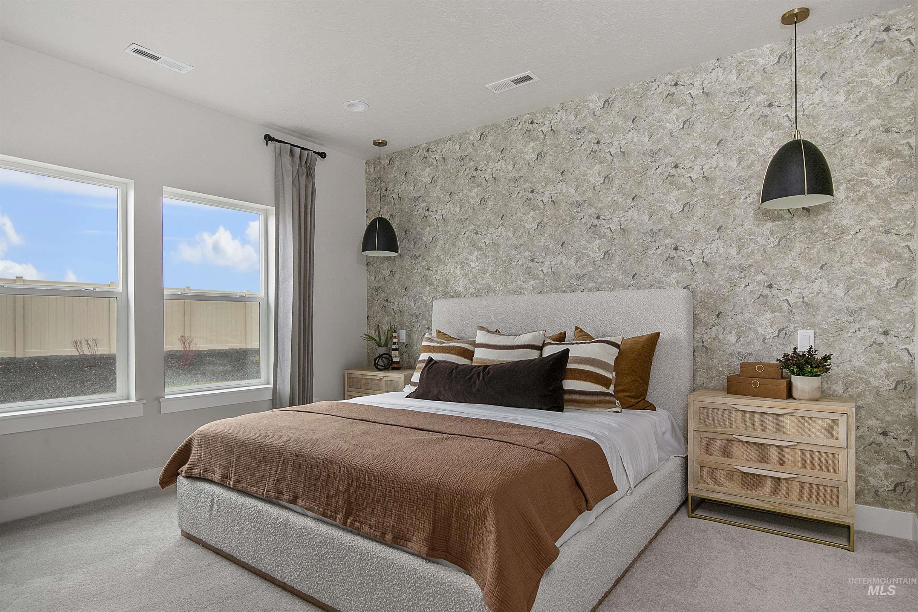 Carpeted bedroom with baseboards